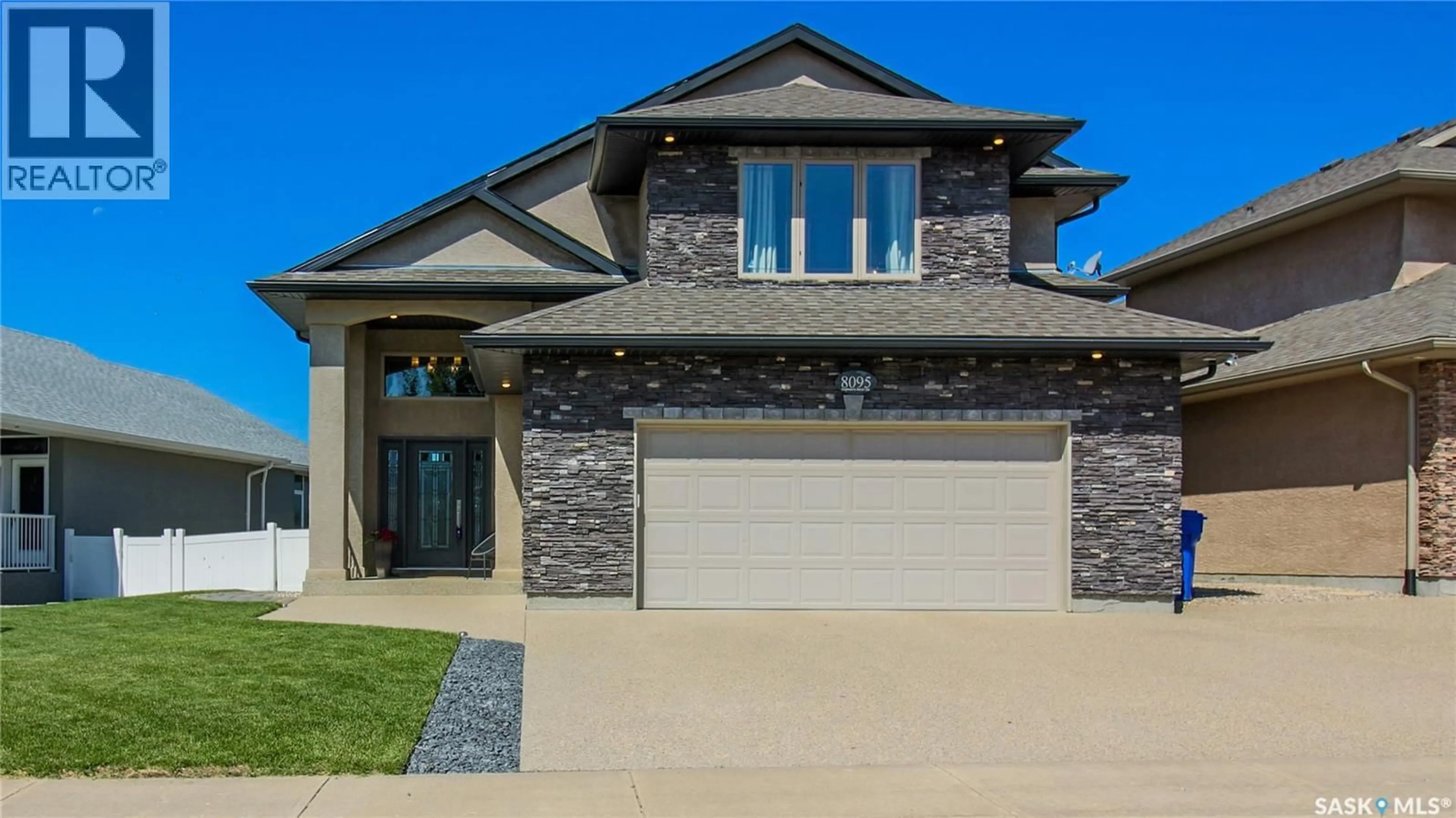 Home with brick exterior material, street for 8095 FAIRWAYS WEST DRIVE, Regina Saskatchewan S4Y0A4