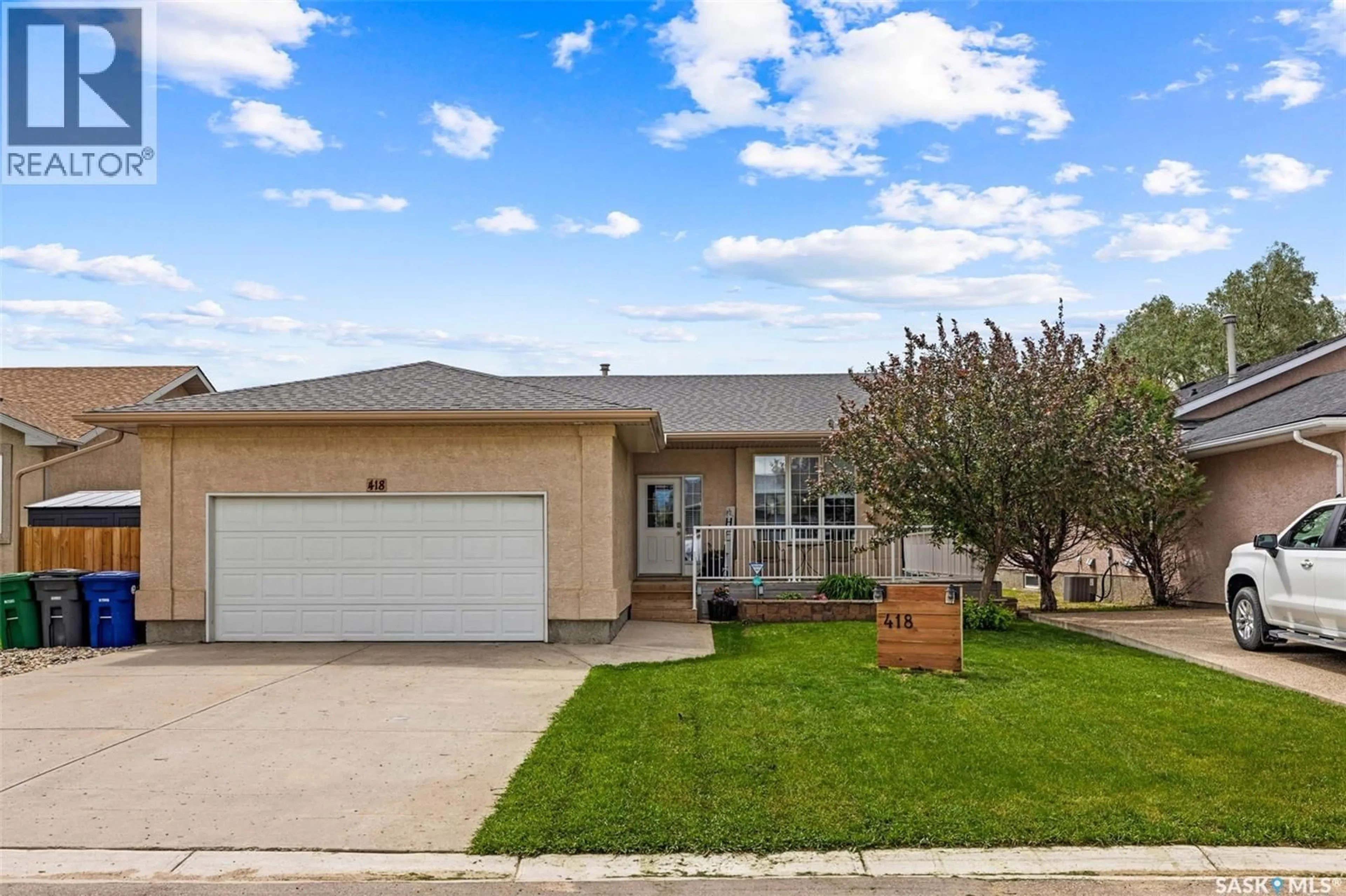 Home with vinyl exterior material, street for 418 HAWKES STREET, Balgonie Saskatchewan S0G0E0