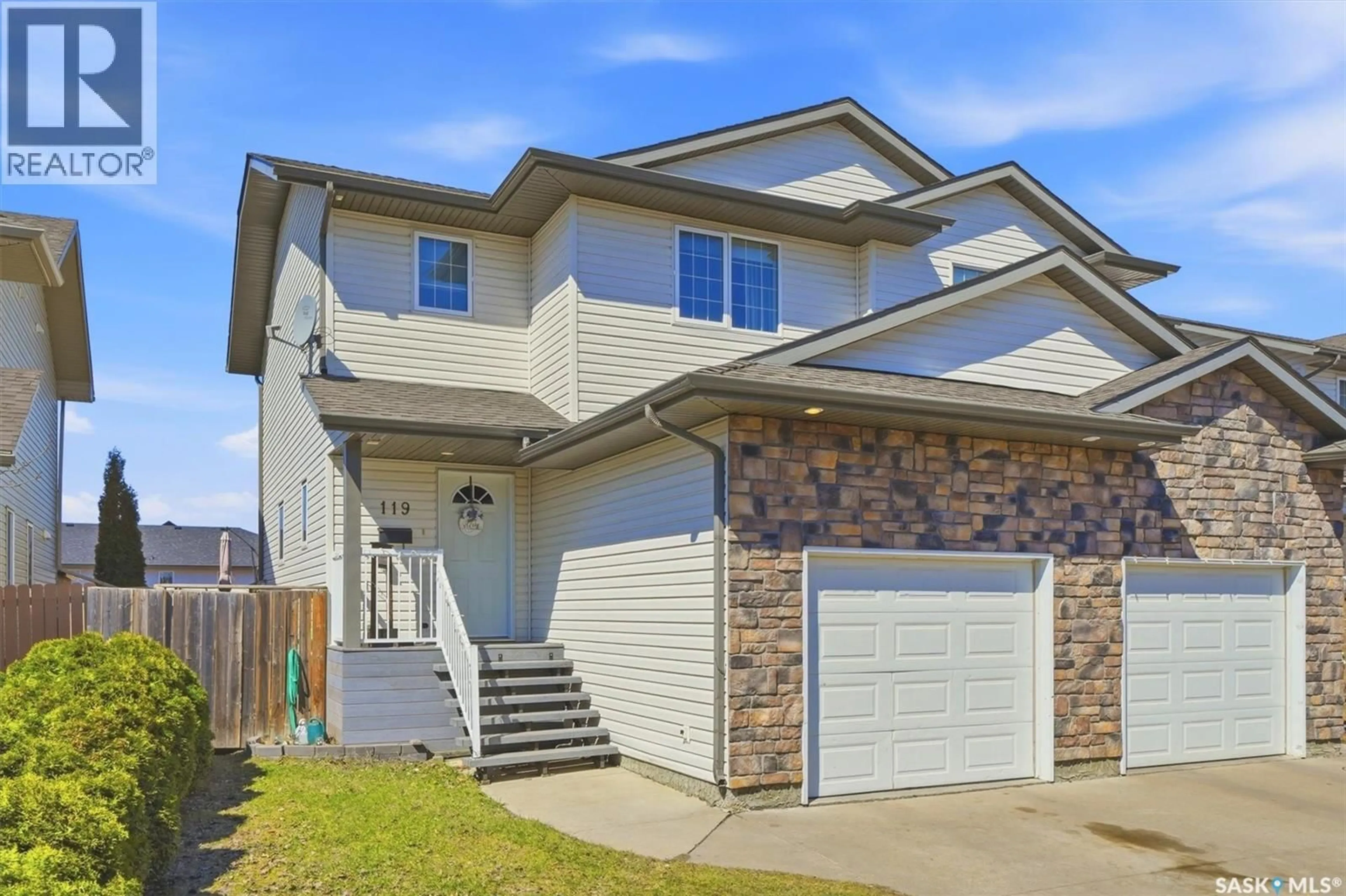 Home with vinyl exterior material, street for 119 MEADOWLARK PARK, Warman Saskatchewan S0K0A1