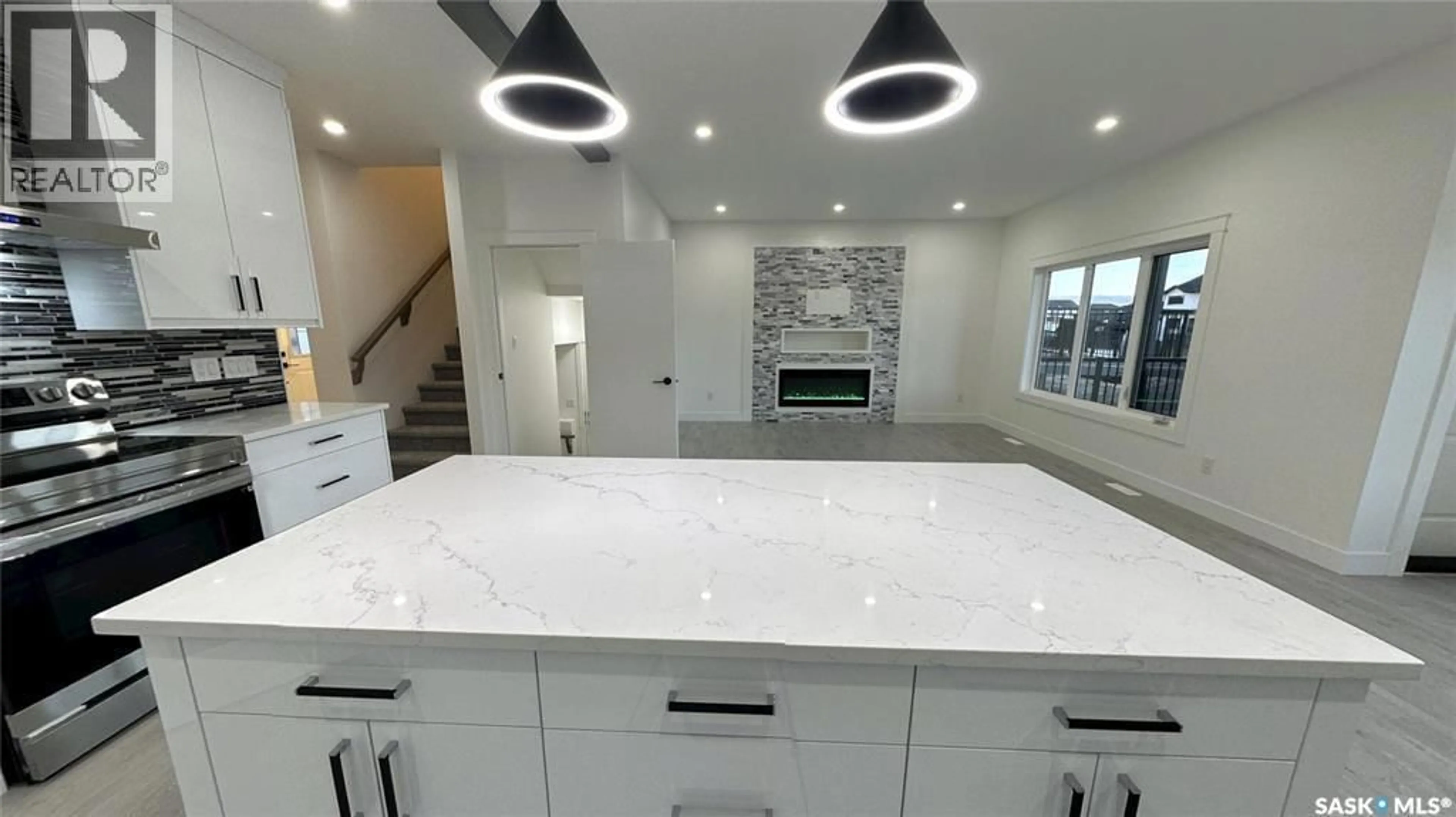 Open concept kitchen, ceramic/tile floor for 443 YUEL CRESCENT, Saskatoon Saskatchewan S7W1N6