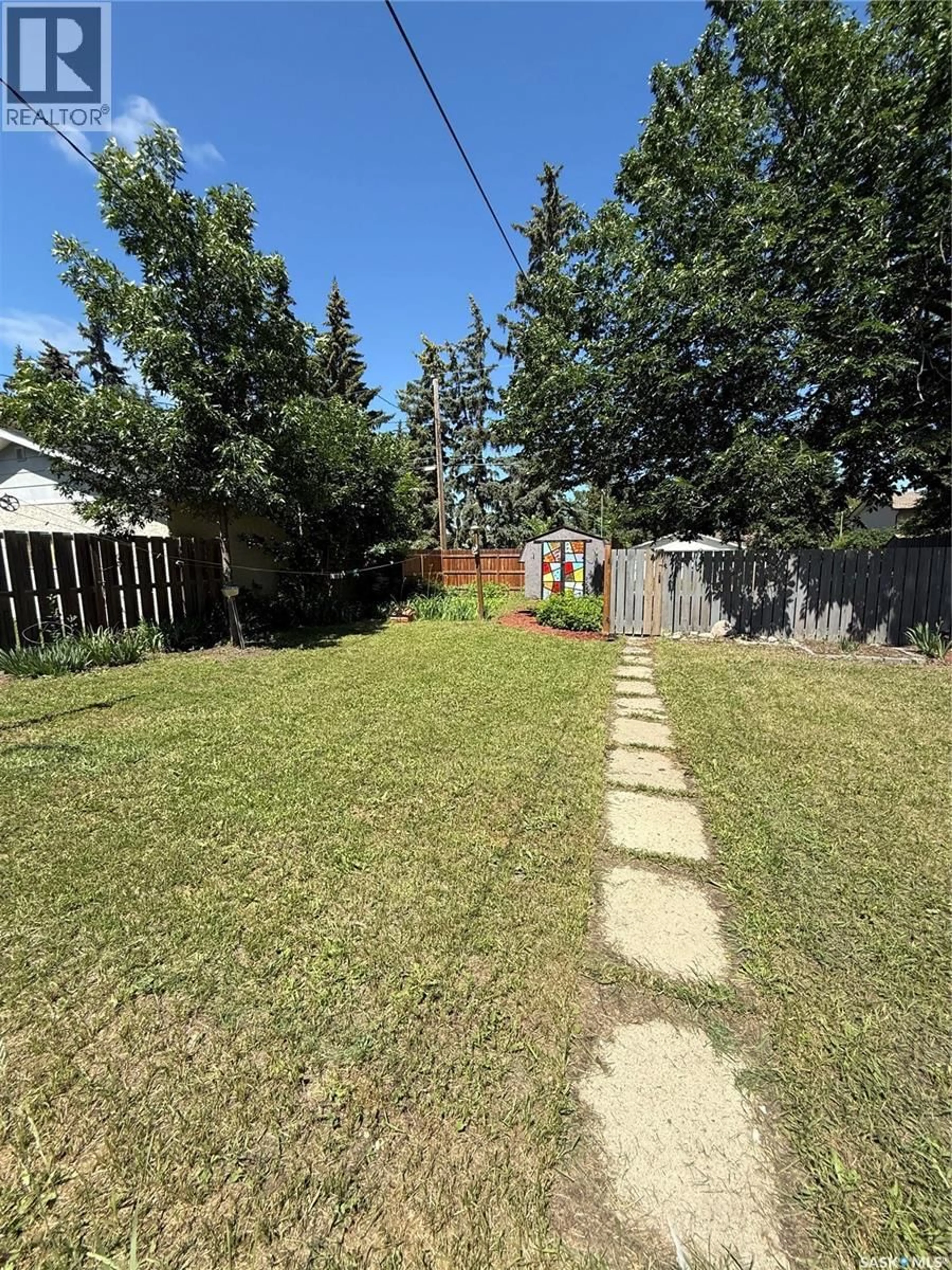 A pic from outside/outdoor area/front of a property/back of a property/a pic from drone, street for 930 VAUGHN STREET, Moose Jaw Saskatchewan S6H5N8