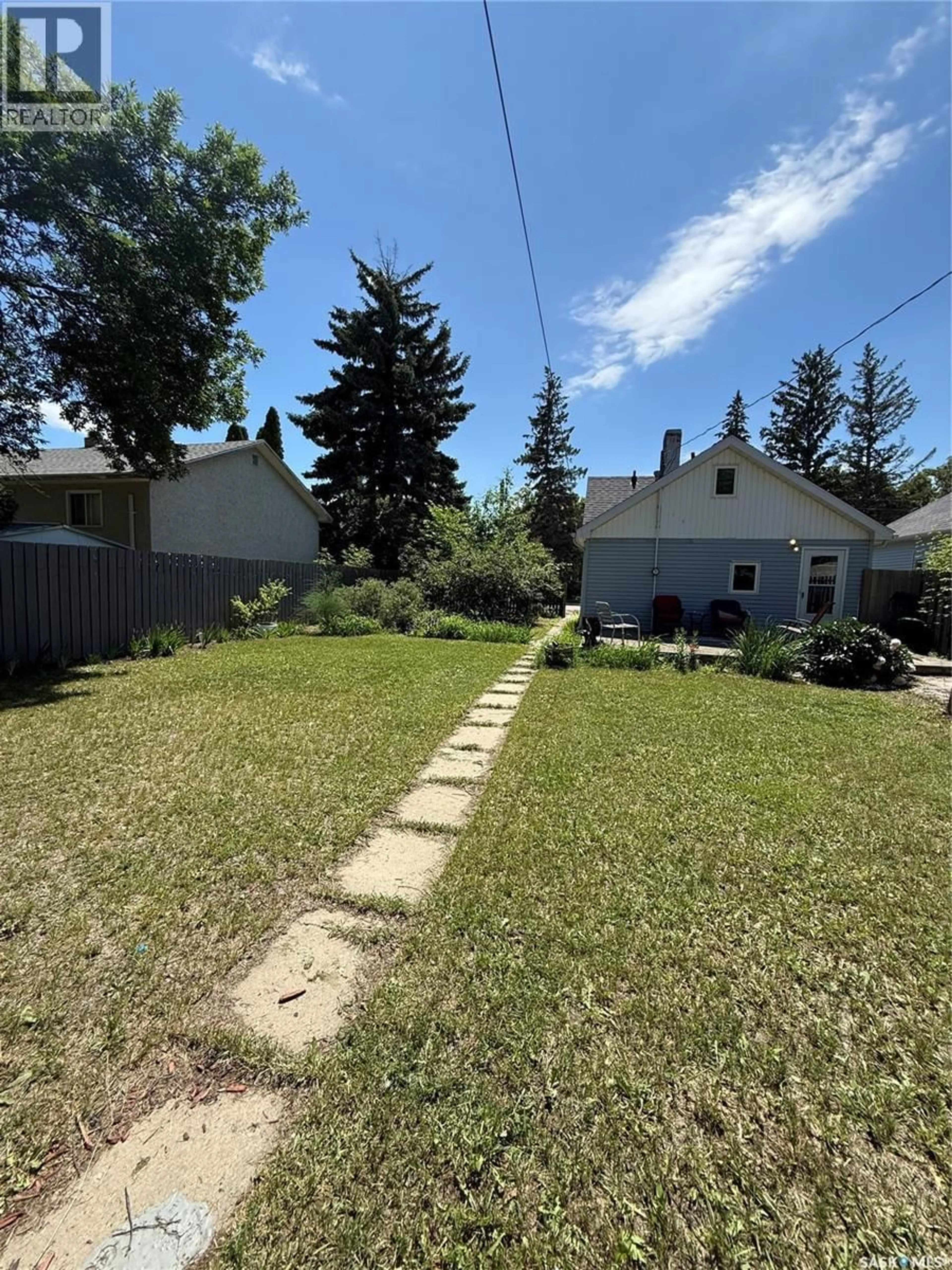A pic from outside/outdoor area/front of a property/back of a property/a pic from drone, street for 930 VAUGHN STREET, Moose Jaw Saskatchewan S6H5N8