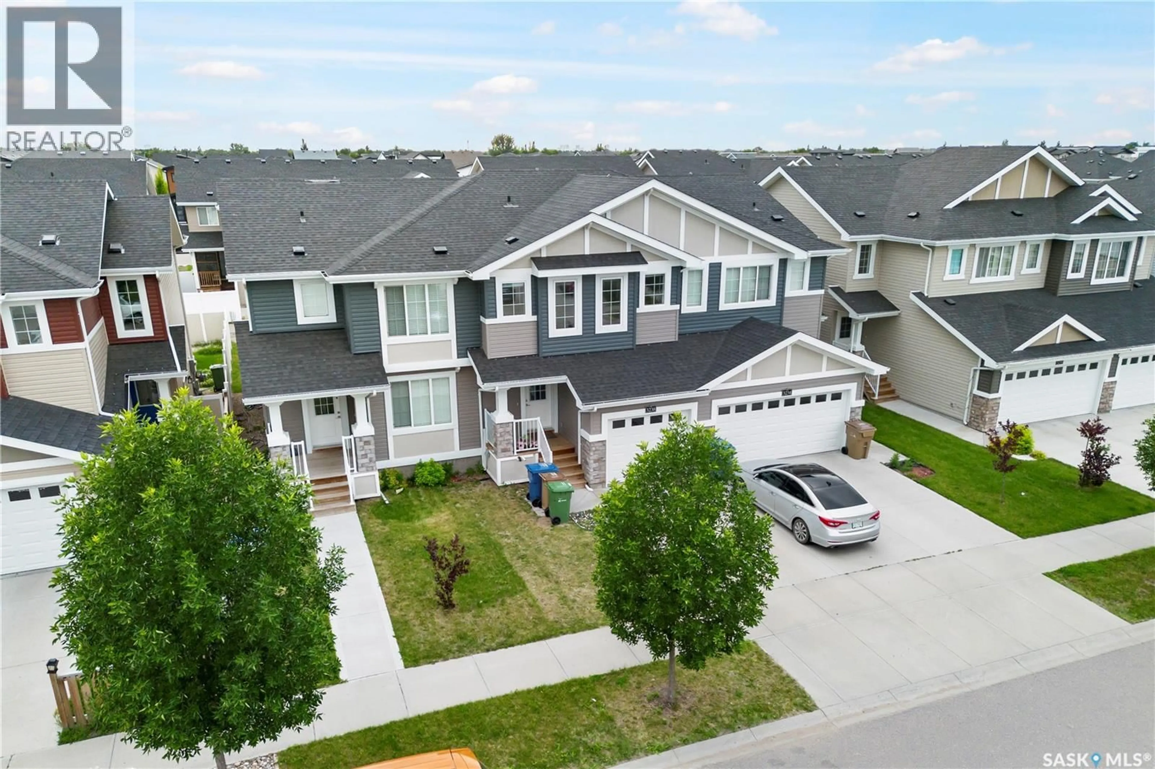 A pic from outside/outdoor area/front of a property/back of a property/a pic from drone, street for 3238 GREEN STONE ROAD, Regina Saskatchewan S4V3R3