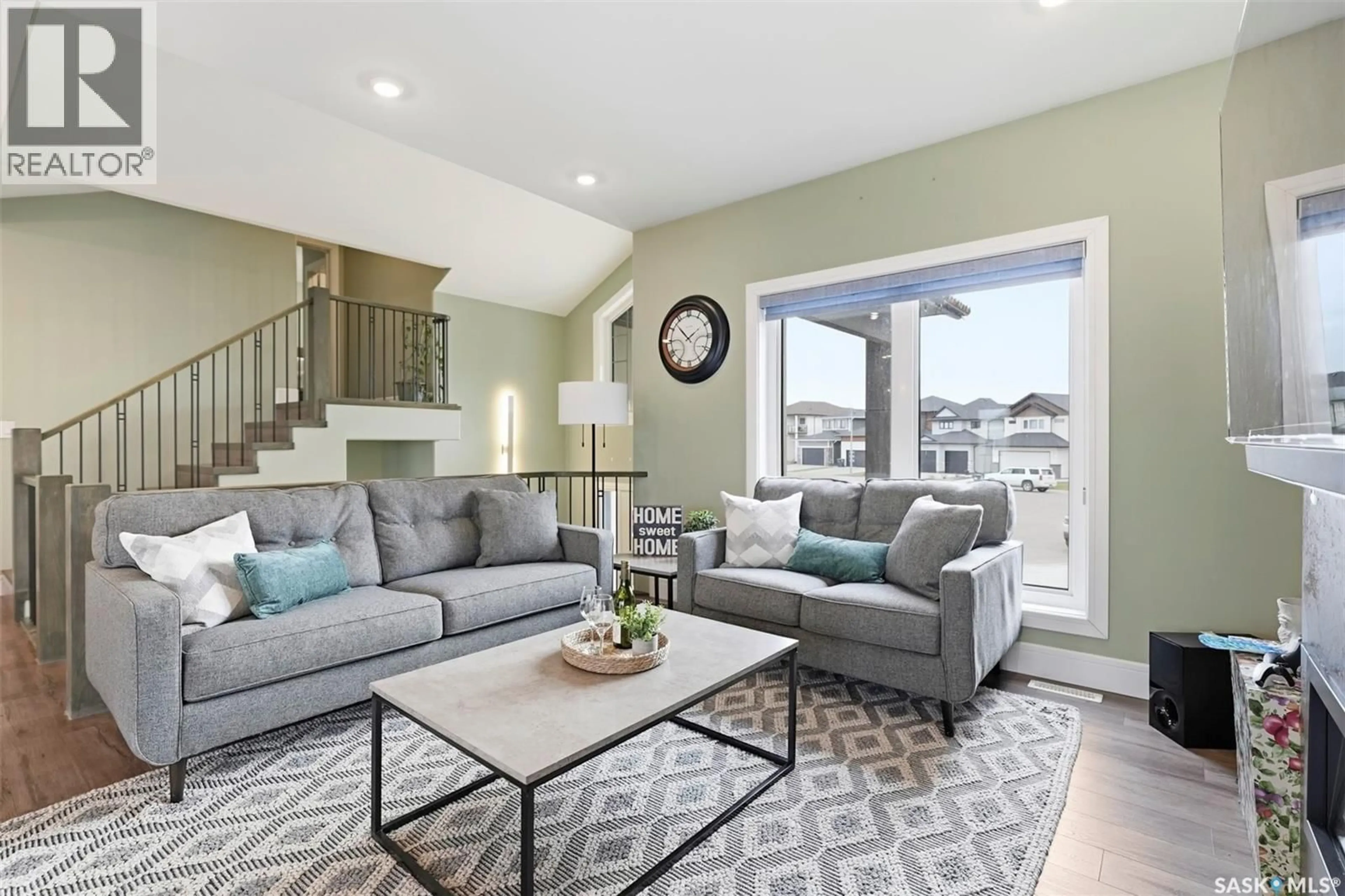 Living room with furniture, unknown for 211 BURGESS BAY, Saskatoon Saskatchewan S7V0S3