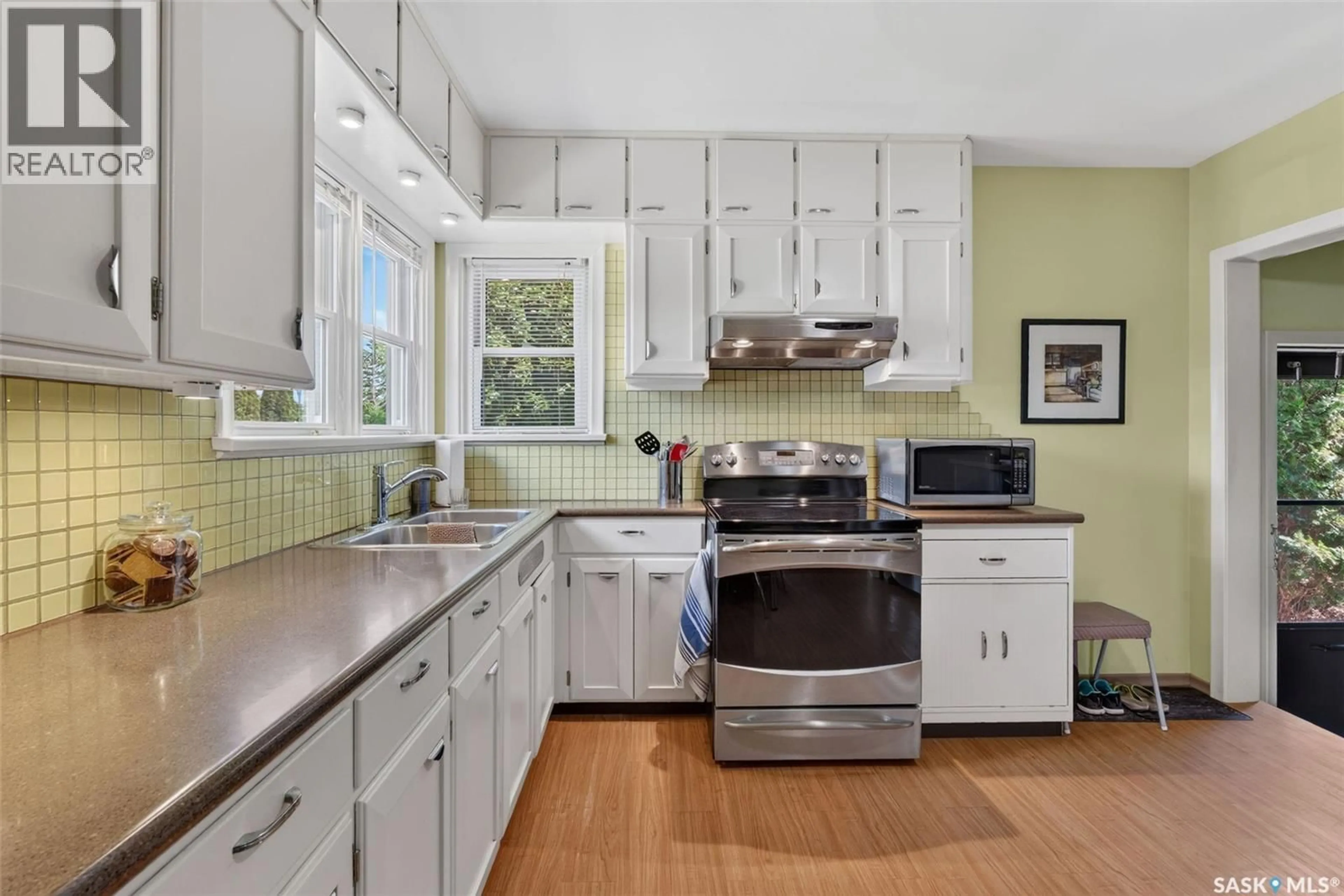 Open concept kitchen, ceramic/tile floor for 673 8TH STREET, Prince Albert Saskatchewan S6V0W8