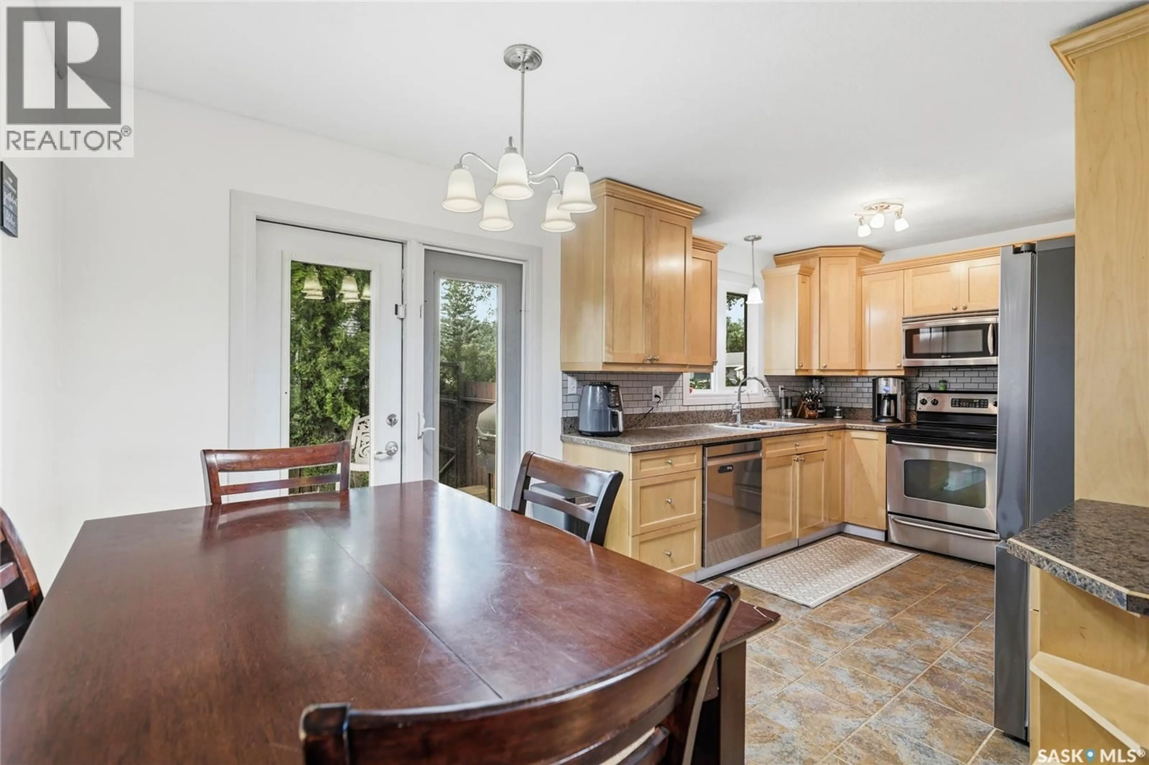 Open concept kitchen, ceramic/tile floor for 251 SANGSTER BOULEVARD, Regina Saskatchewan S4R7H2