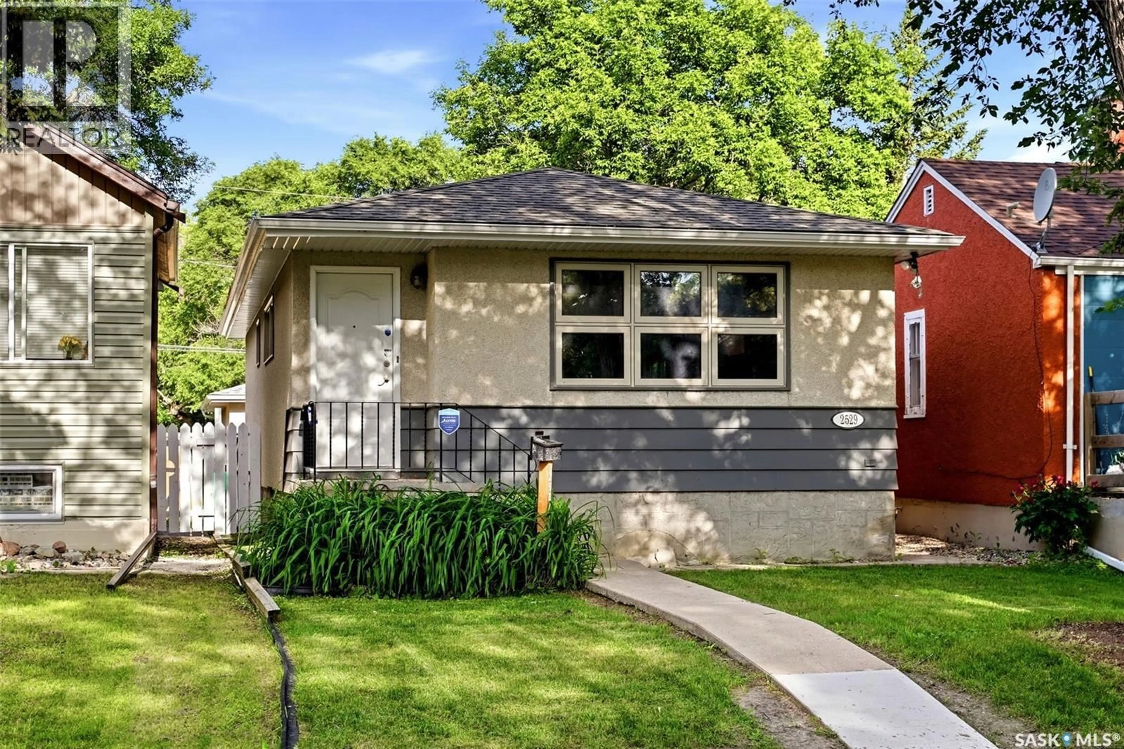 Home with vinyl exterior material, street for 2529 ATKINSON STREET, Regina Saskatchewan S4W3X8