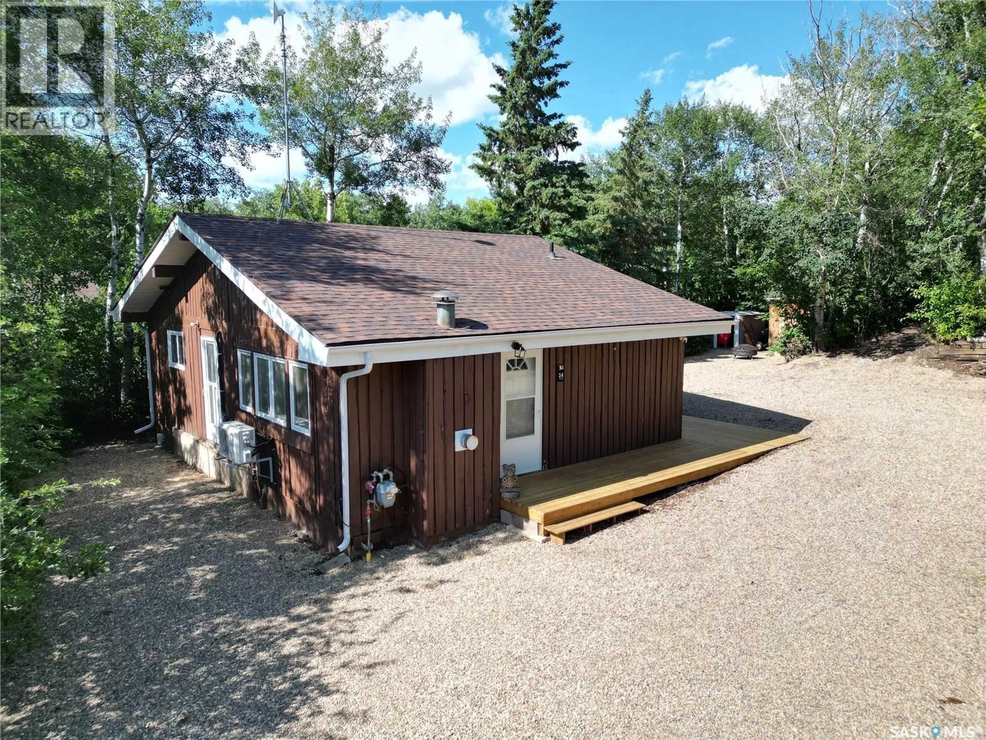 A pic from outside/outdoor area/front of a property/back of a property/a pic from drone, unknown for 34 GADDESBY CRESCENT, Jackfish Lake Saskatchewan S0M0L0