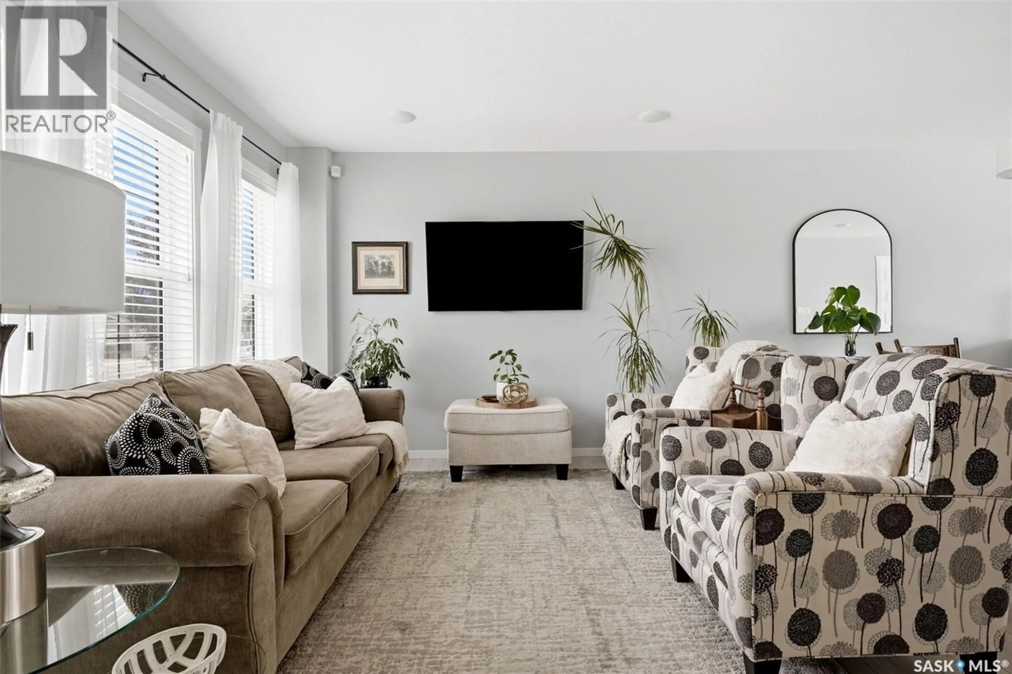 Living room with furniture, carpet floor for 5477 CADE STREET, Regina Saskatchewan S4V3N9
