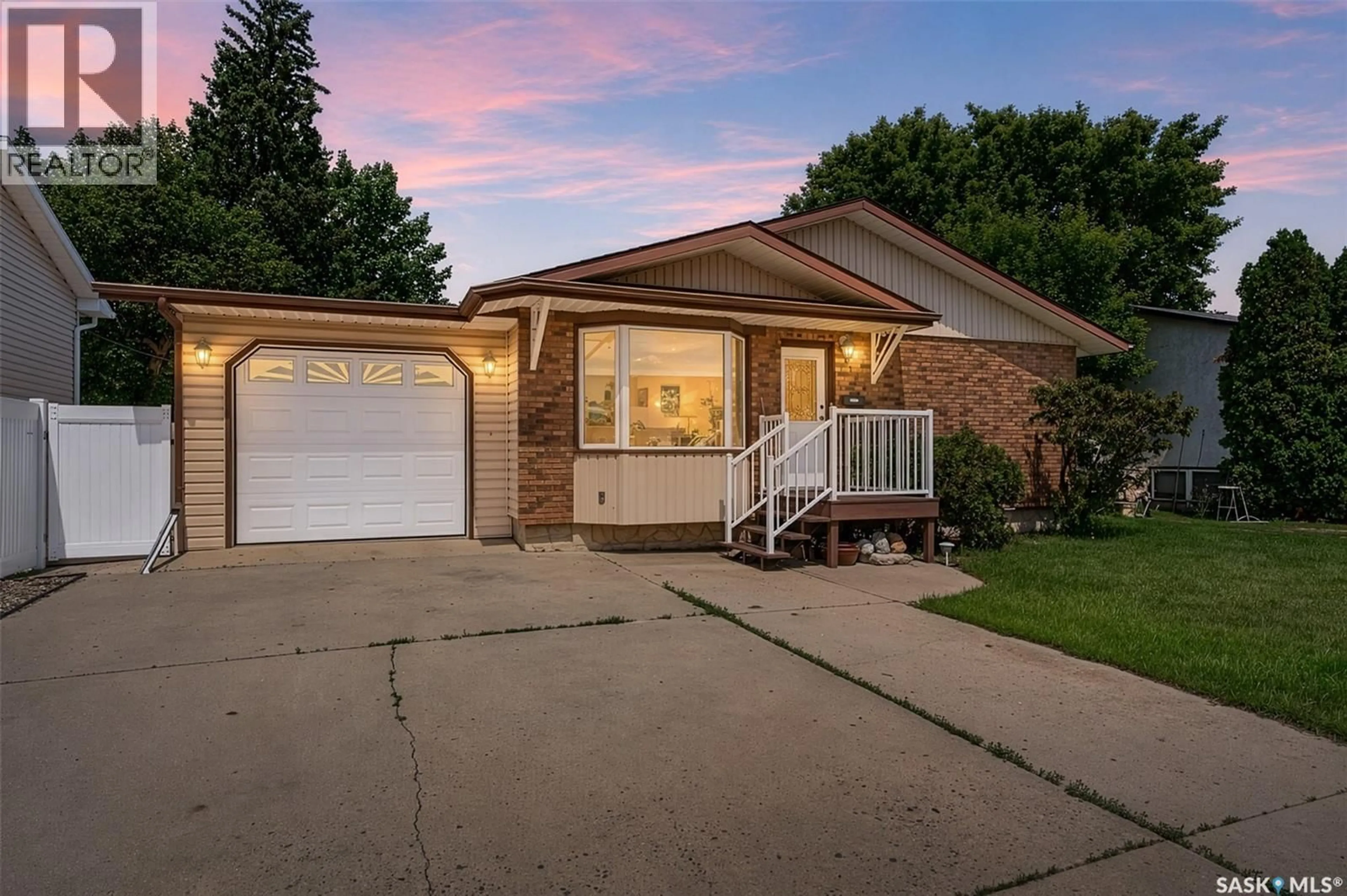 Home with vinyl exterior material, street for 1154 WARNER STREET, Moose Jaw Saskatchewan S6H6L2