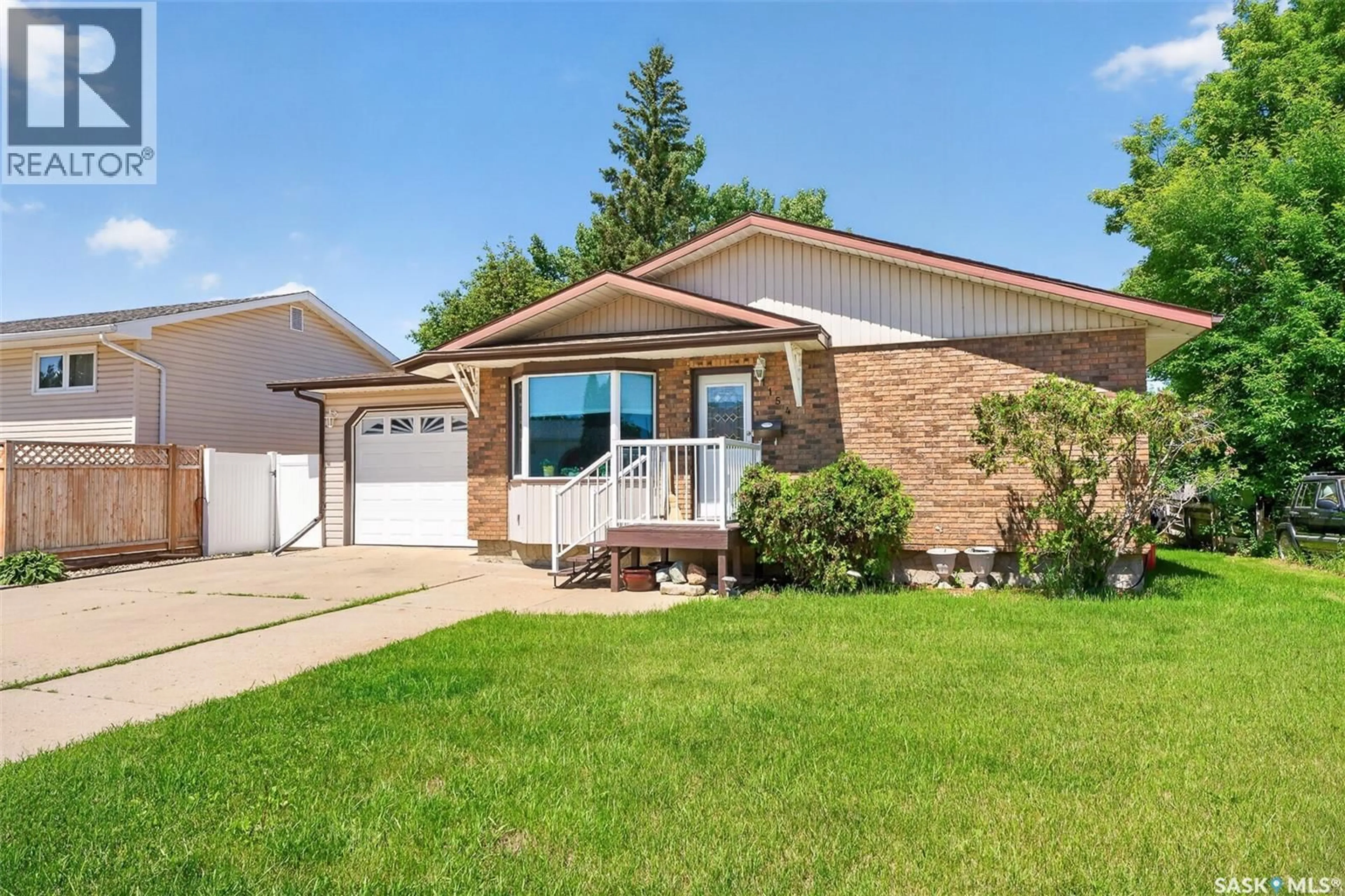 Home with vinyl exterior material, street for 1154 WARNER STREET, Moose Jaw Saskatchewan S6H6L2