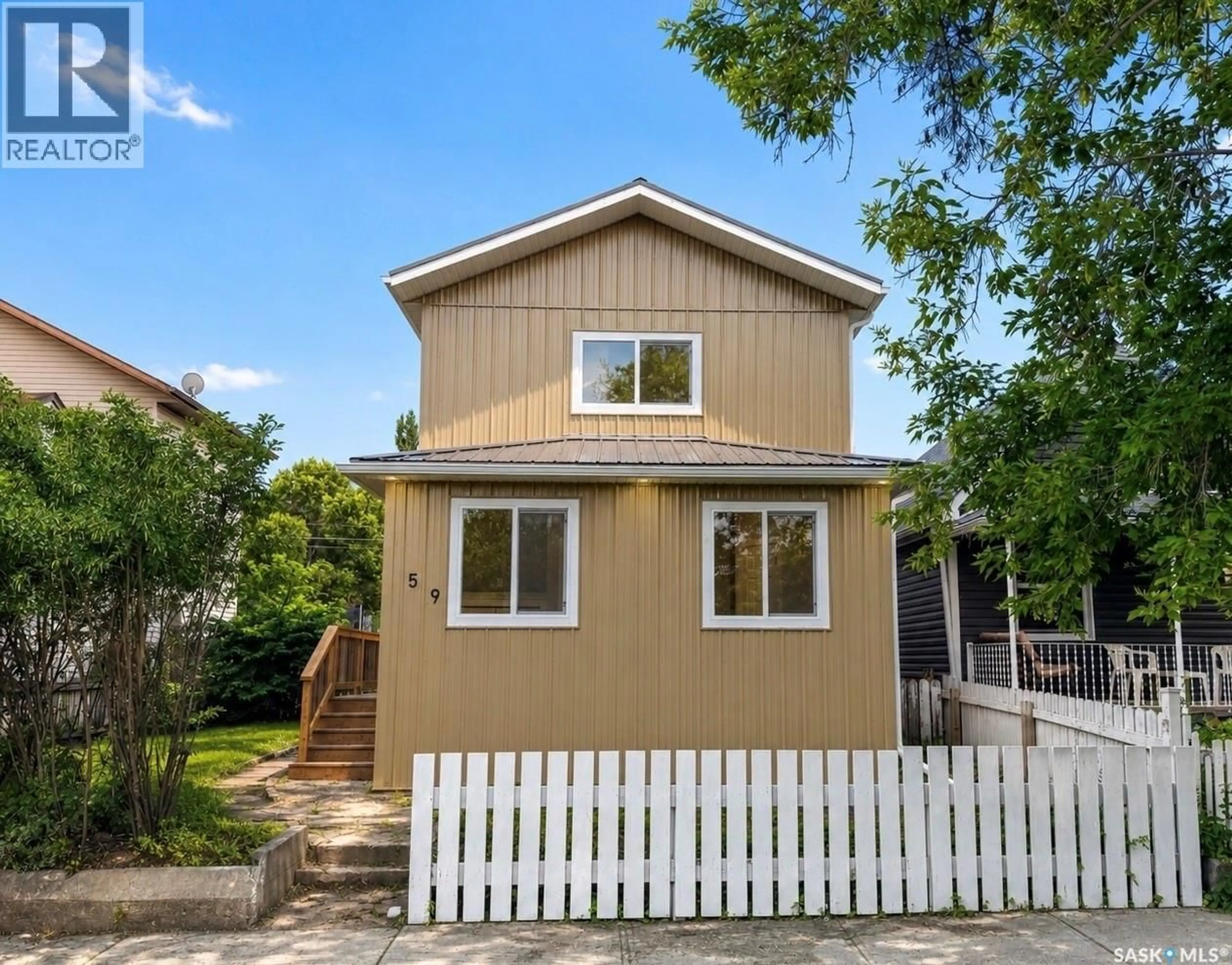 Home with vinyl exterior material, street for 59 LILLOOET STREET, Moose Jaw Saskatchewan S6H4S3