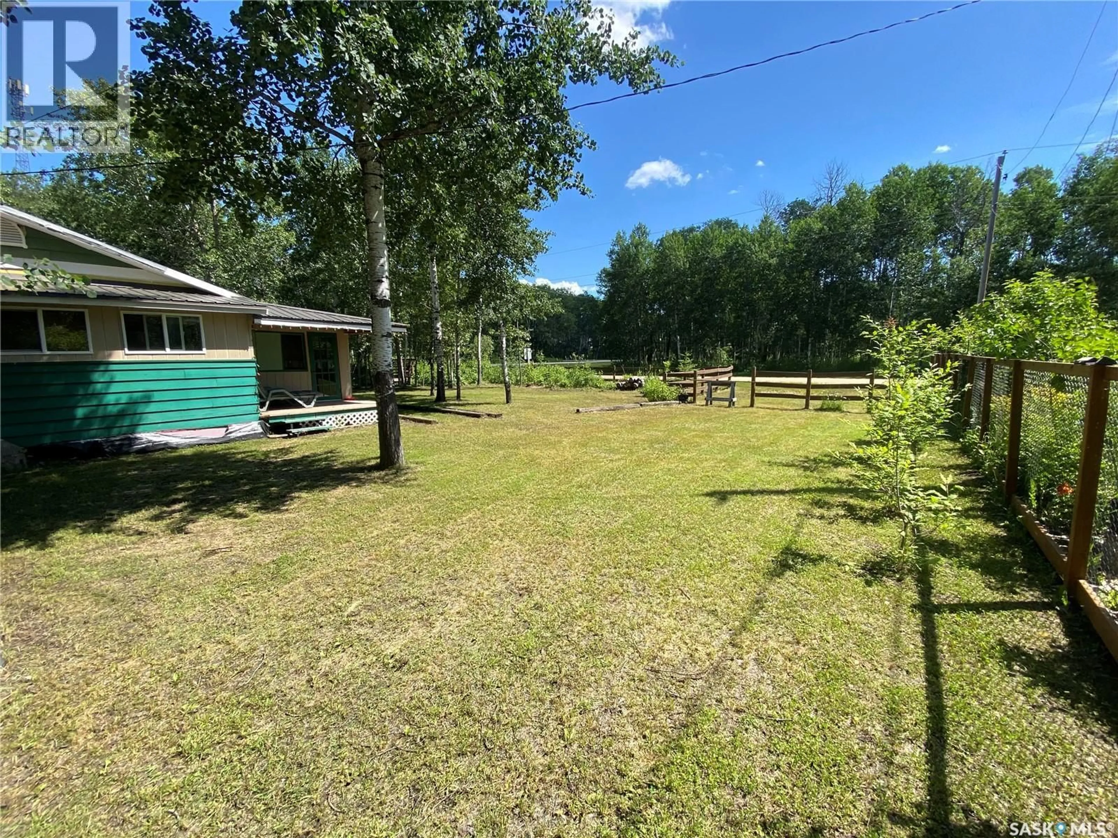 A pic from outside/outdoor area/front of a property/back of a property/a pic from drone, forest/trees view for 114-115 GOVERNMENT ROAD, Good Spirit Lake Saskatchewan S0A0L0