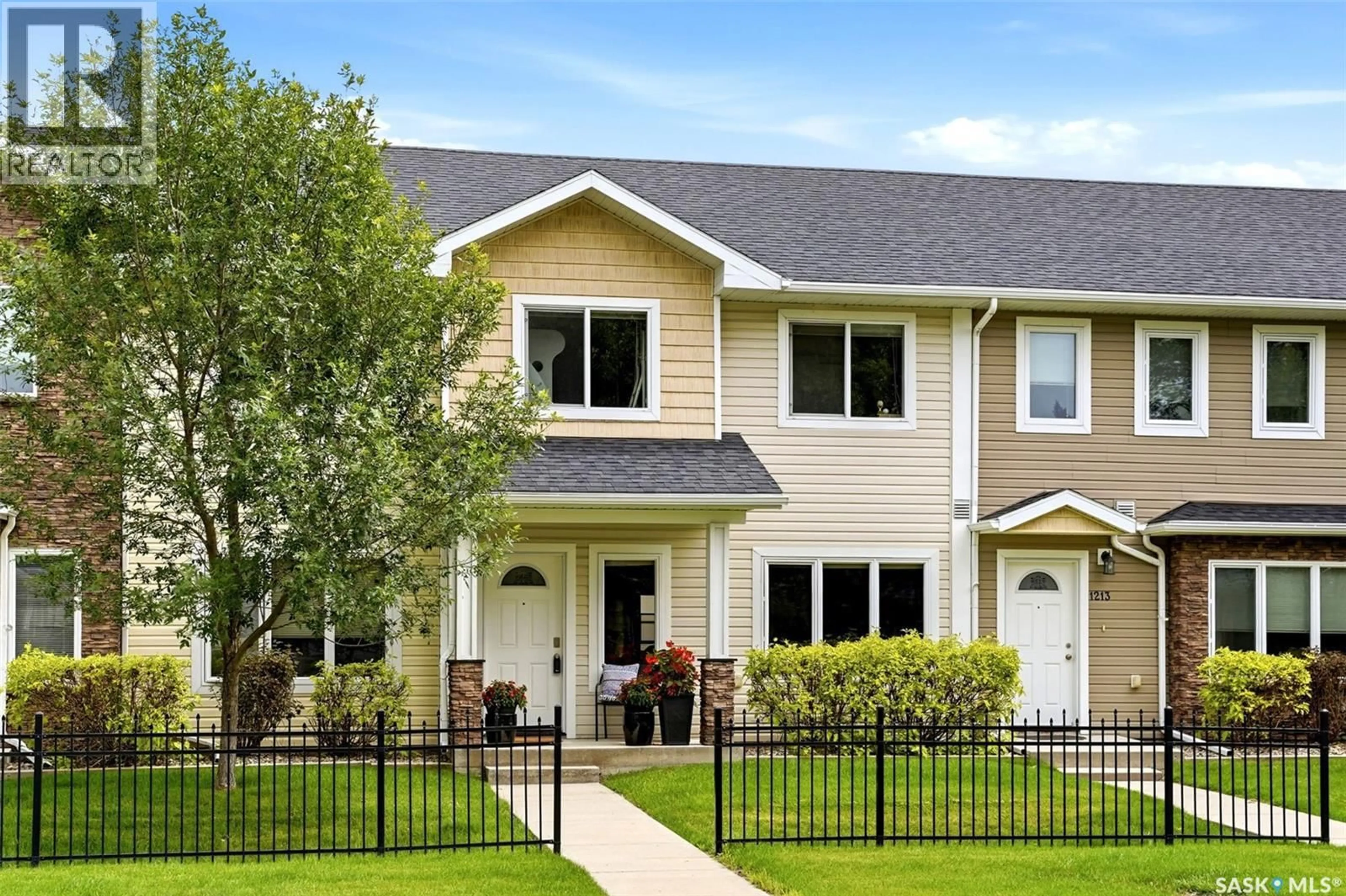 Home with vinyl exterior material, street for 1209 GREY STREET, Regina Saskatchewan S4T1G7
