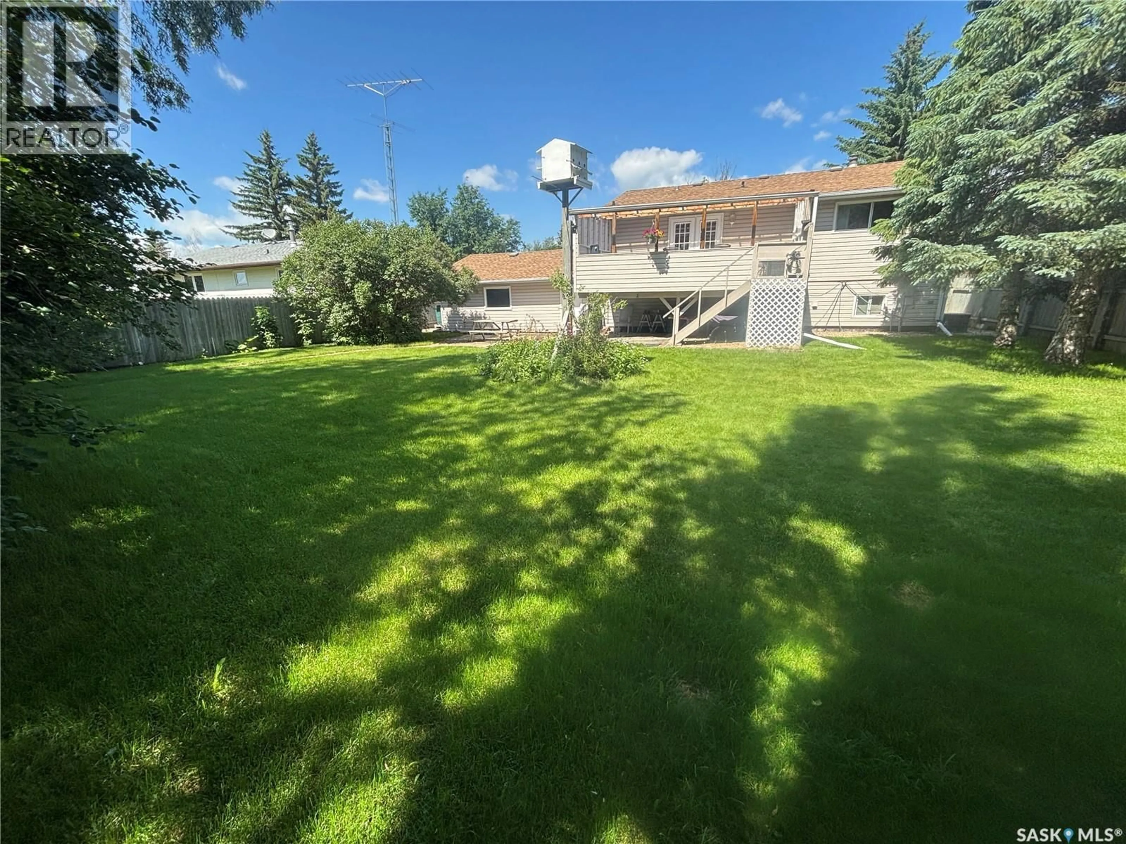 A pic from outside/outdoor area/front of a property/back of a property/a pic from drone, street for 203 CASKEY DRIVE, Melfort Saskatchewan S0E1A0