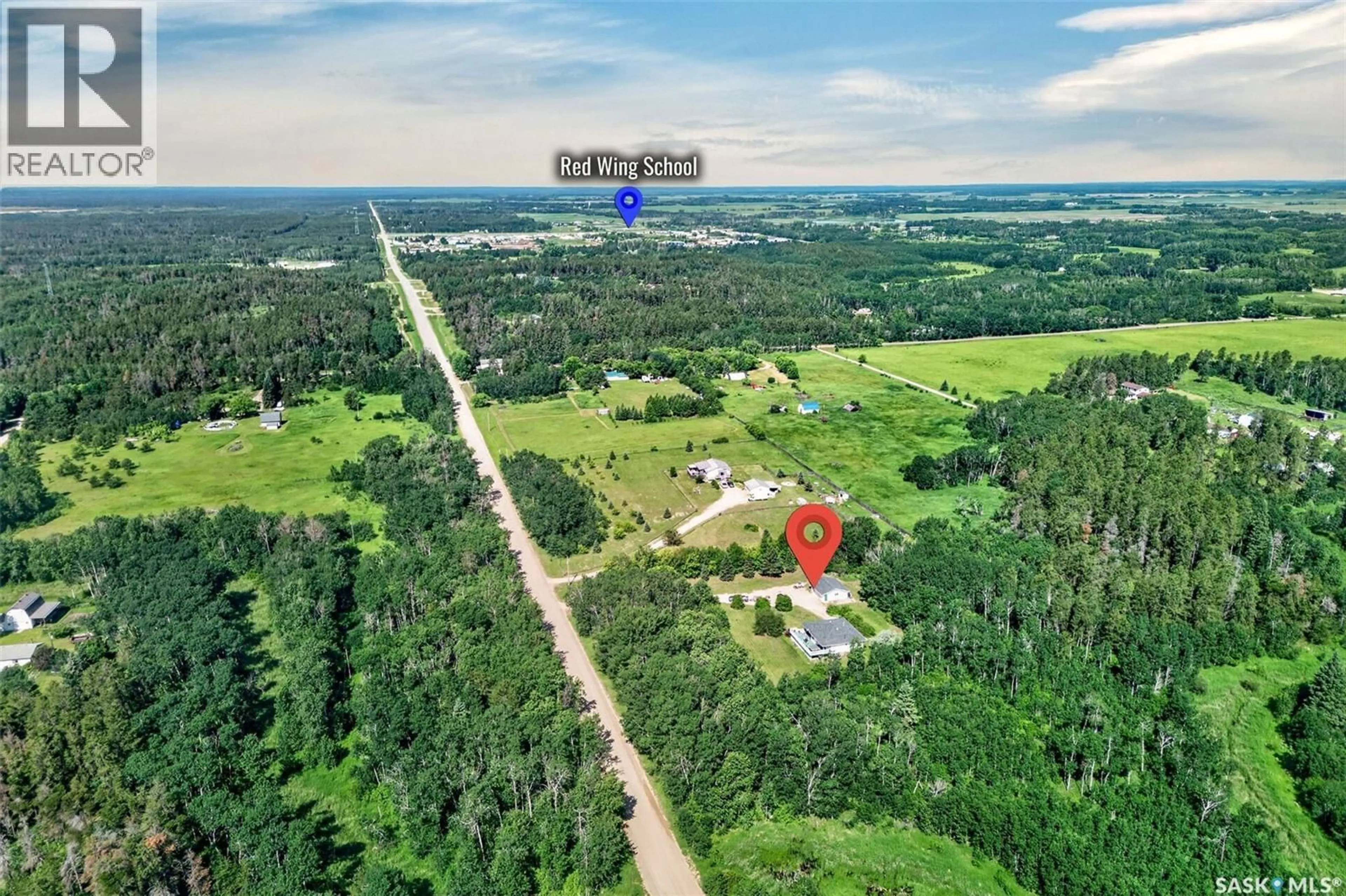 A pic from outside/outdoor area/front of a property/back of a property/a pic from drone, forest/trees view for 111 REDWING ROAD, Buckland Rm No. 491 Saskatchewan S6V5R3