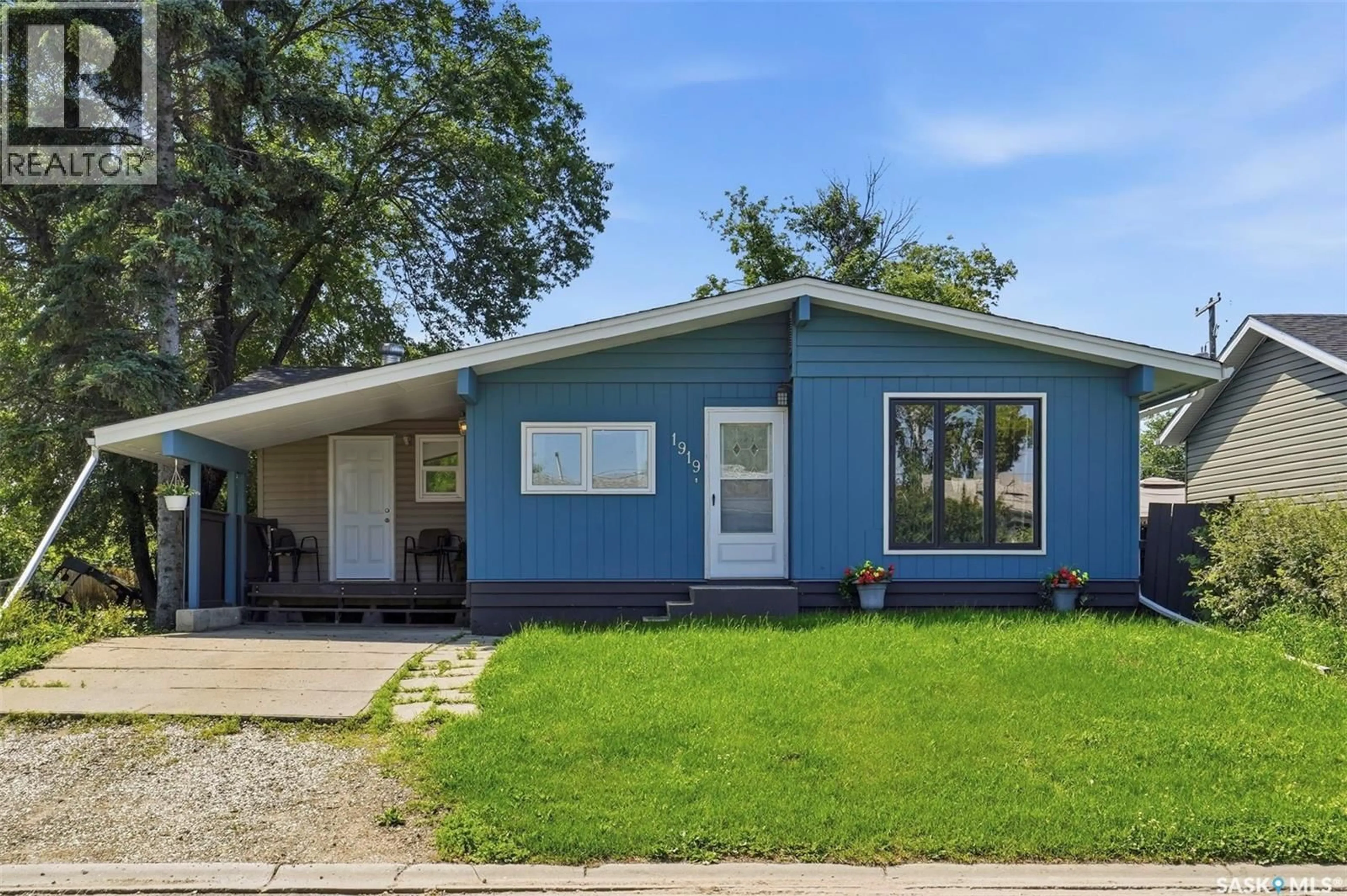 Home with vinyl exterior material, street for 1919 14TH STREET, Prince Albert Saskatchewan S6V3P3