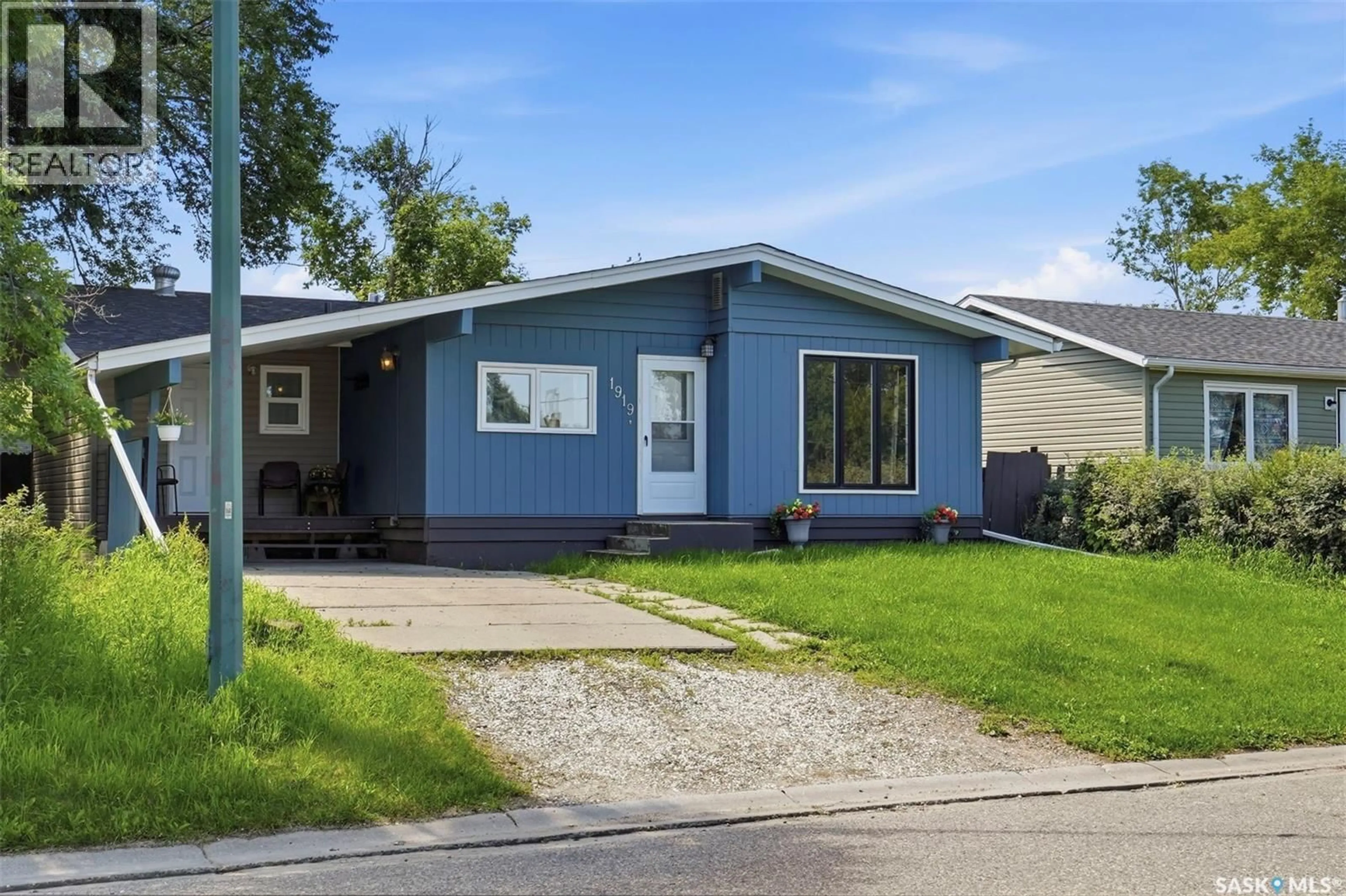 Home with vinyl exterior material, street for 1919 14TH STREET, Prince Albert Saskatchewan S6V3P3