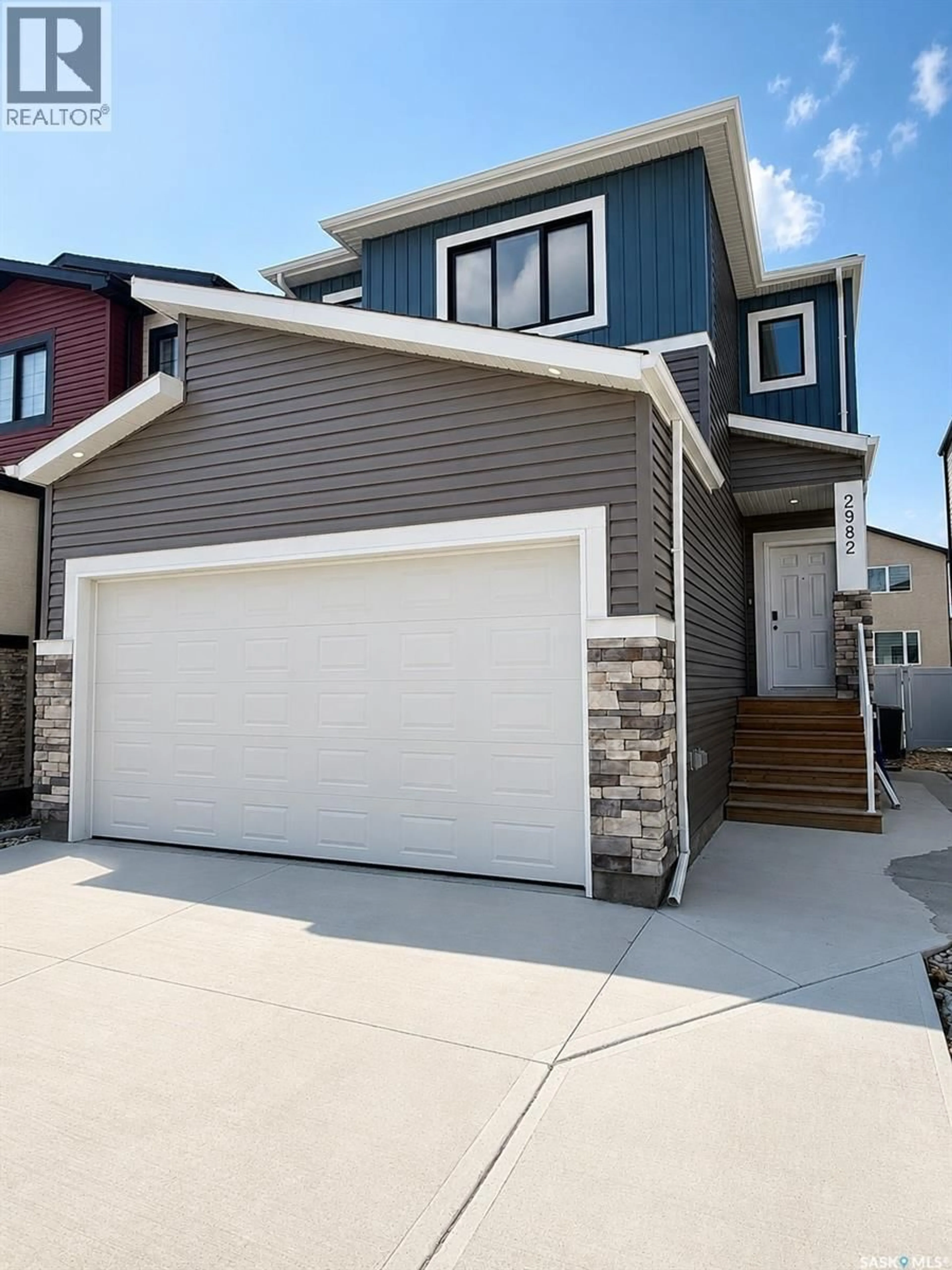 Home with vinyl exterior material, street for 2982 GREEN BROOK ROAD, Regina Saskatchewan S4V3Z6