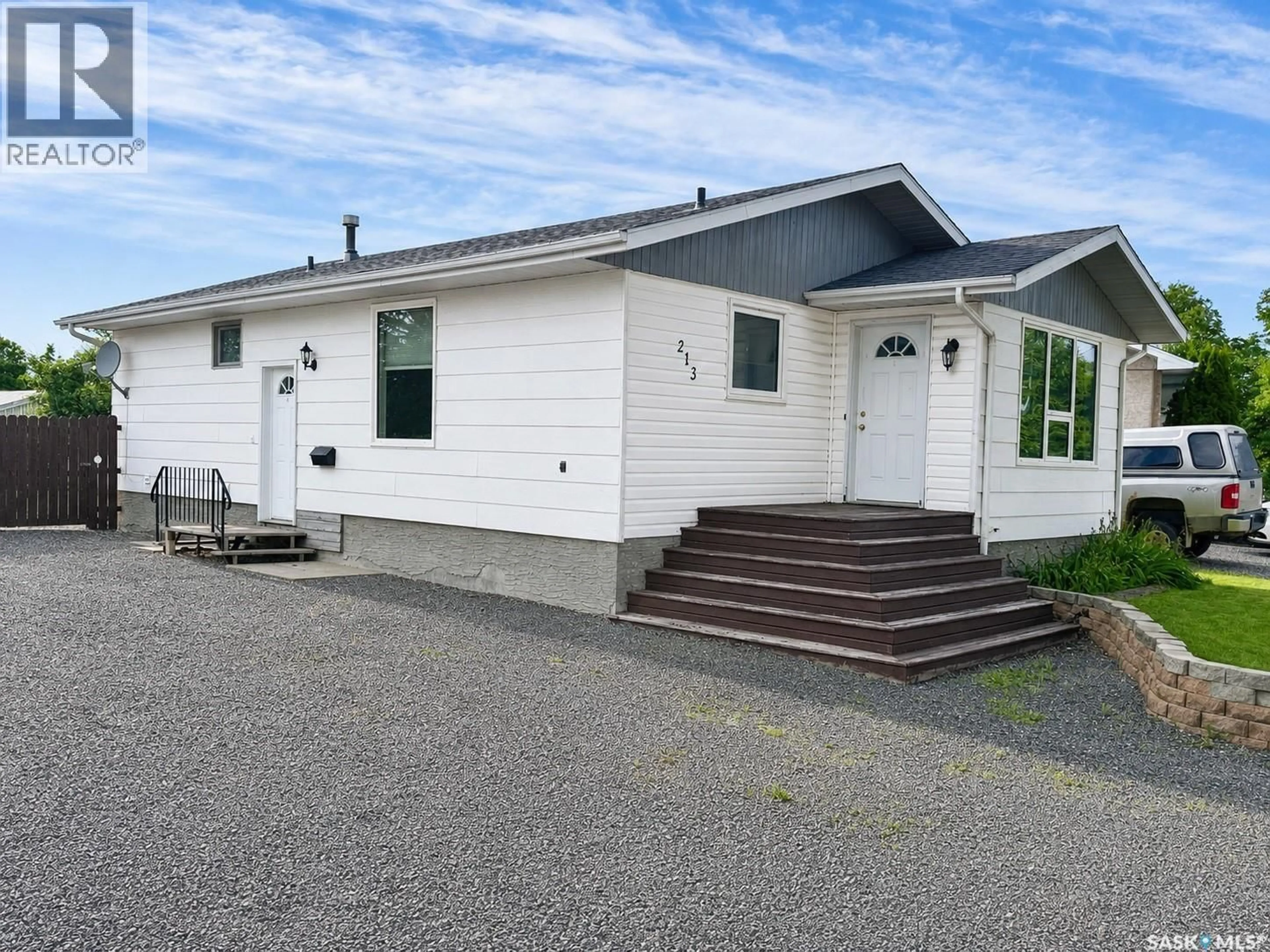 Home with vinyl exterior material, building for 213 18TH STREET, Weyburn Saskatchewan S4H3J4