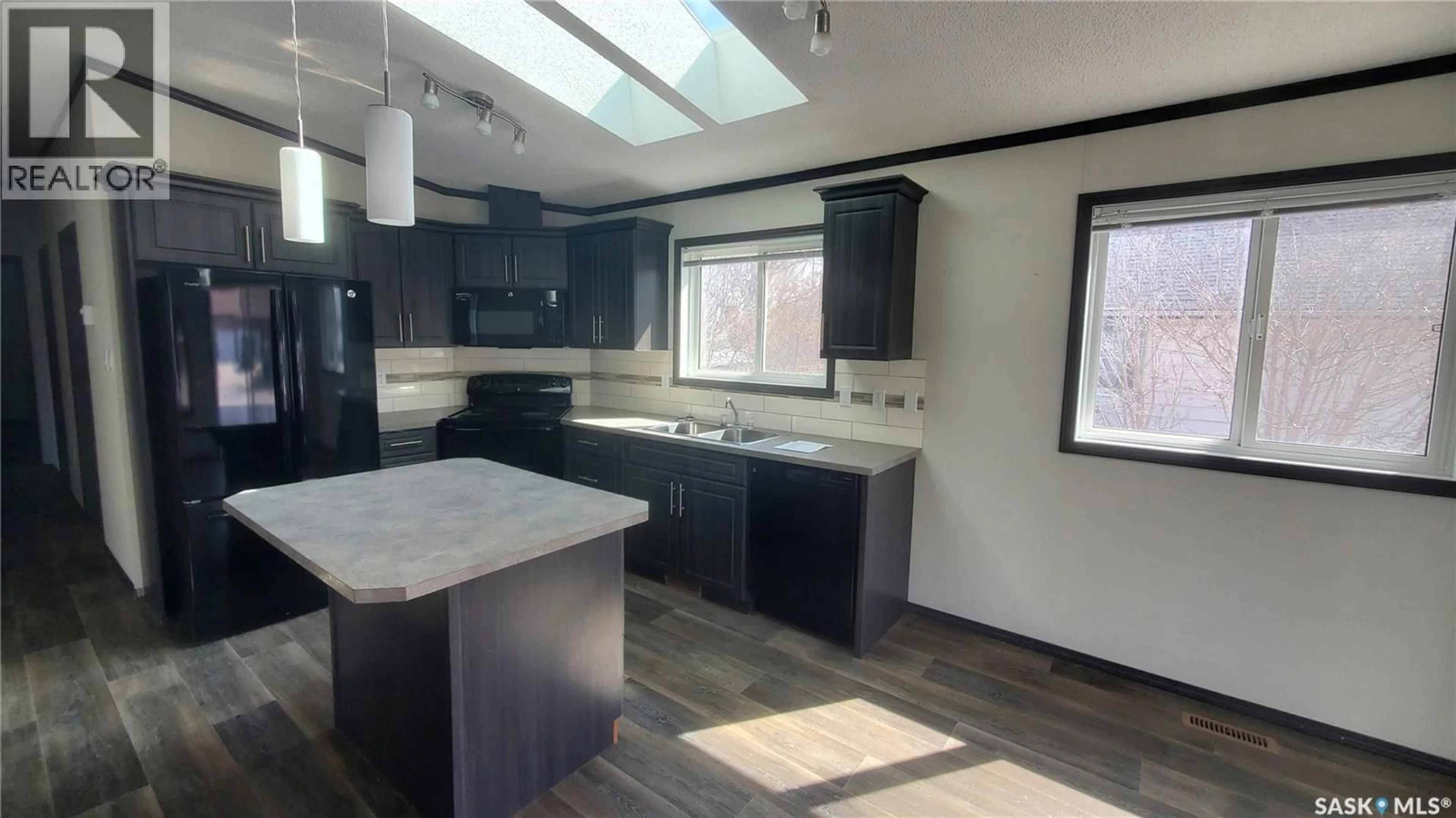 Open concept kitchen, unknown for 405 2ND AVENUE, Weyburn Saskatchewan S4H1W9
