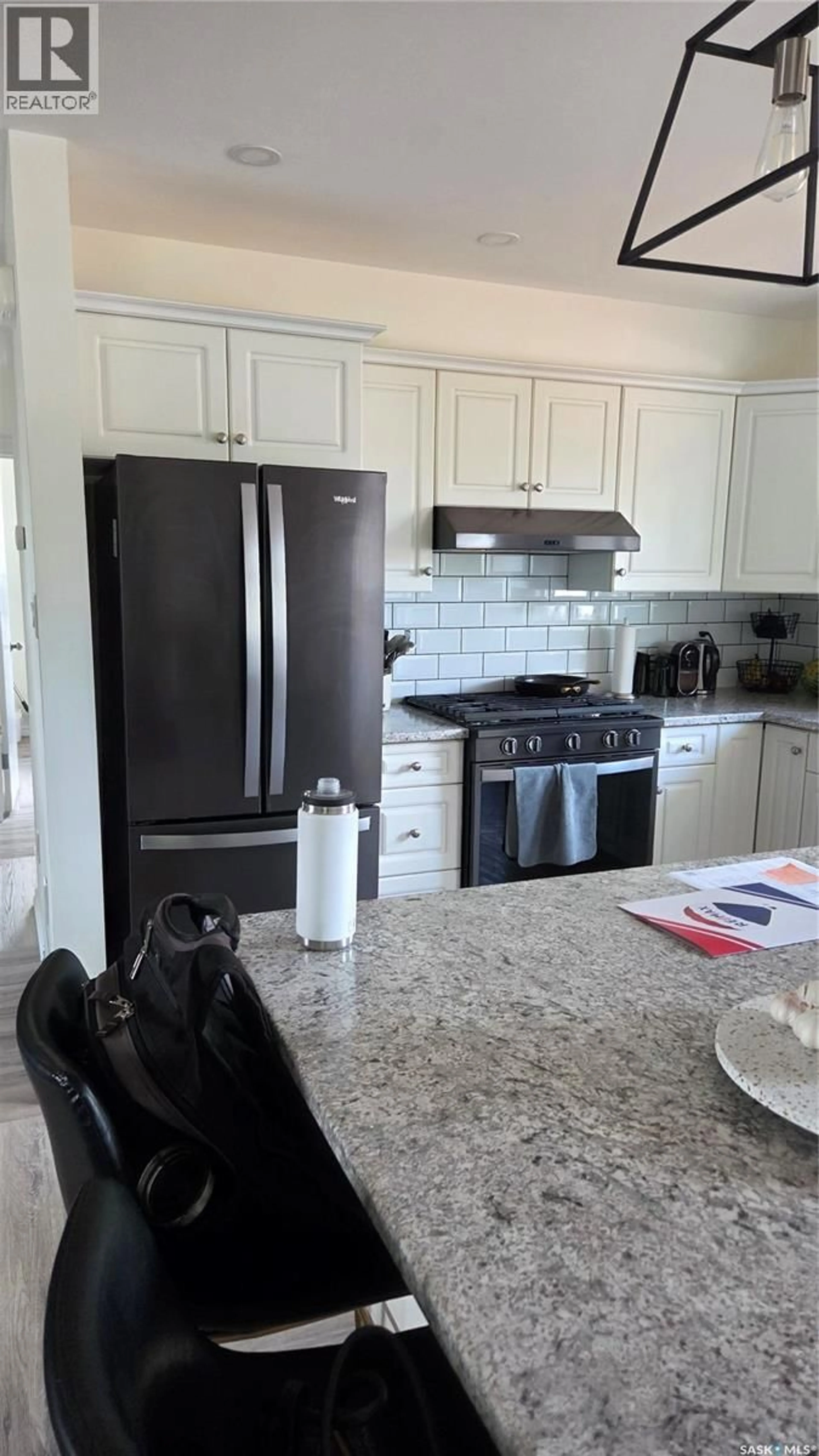 Open concept kitchen, ceramic/tile floor for 1322 QUEEN CRESCENT, Moose Jaw Saskatchewan S6H3G4