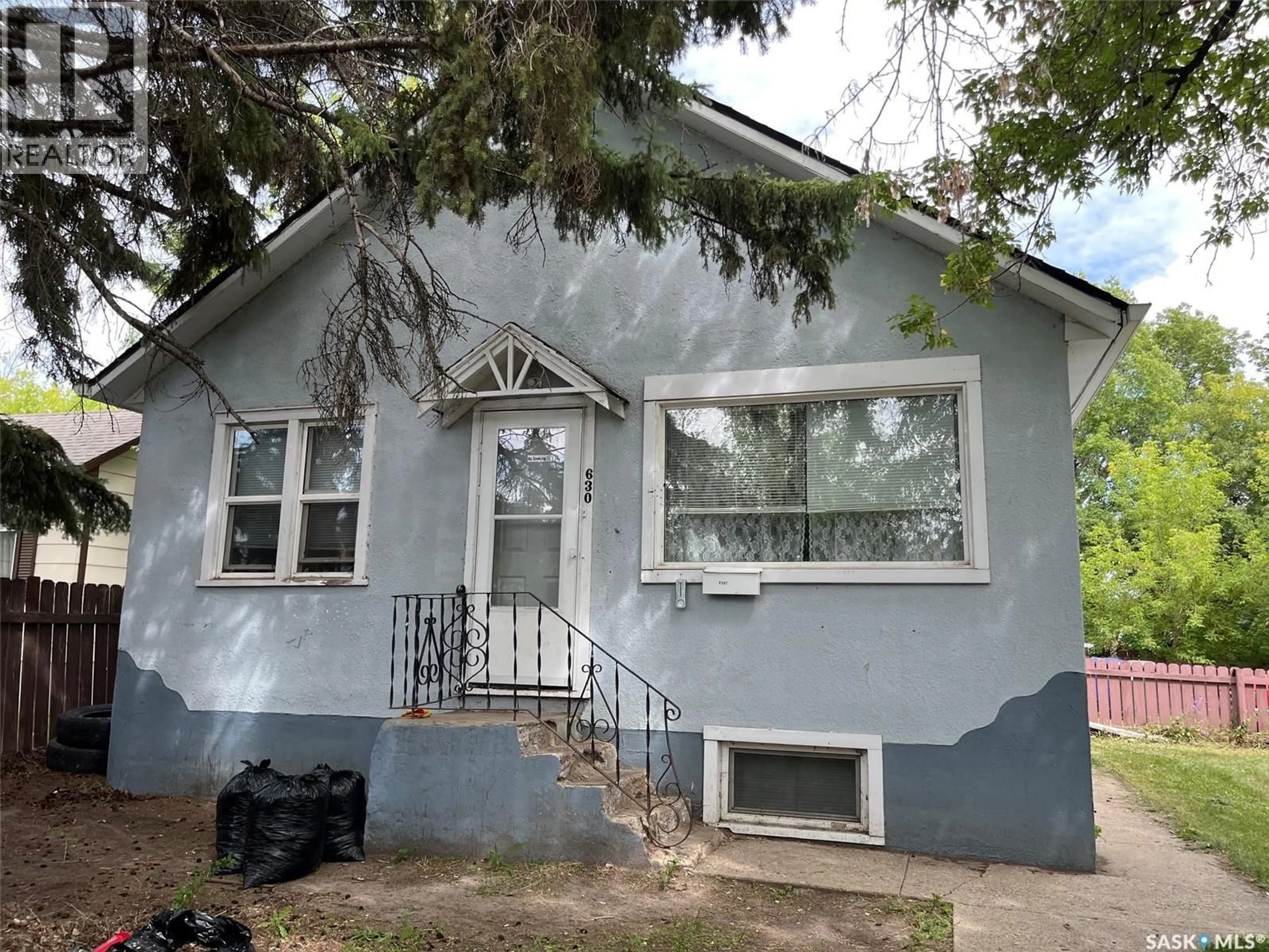 Home with vinyl exterior material, street for 630 5TH AVENUE, Prince Albert Saskatchewan S6V2H5