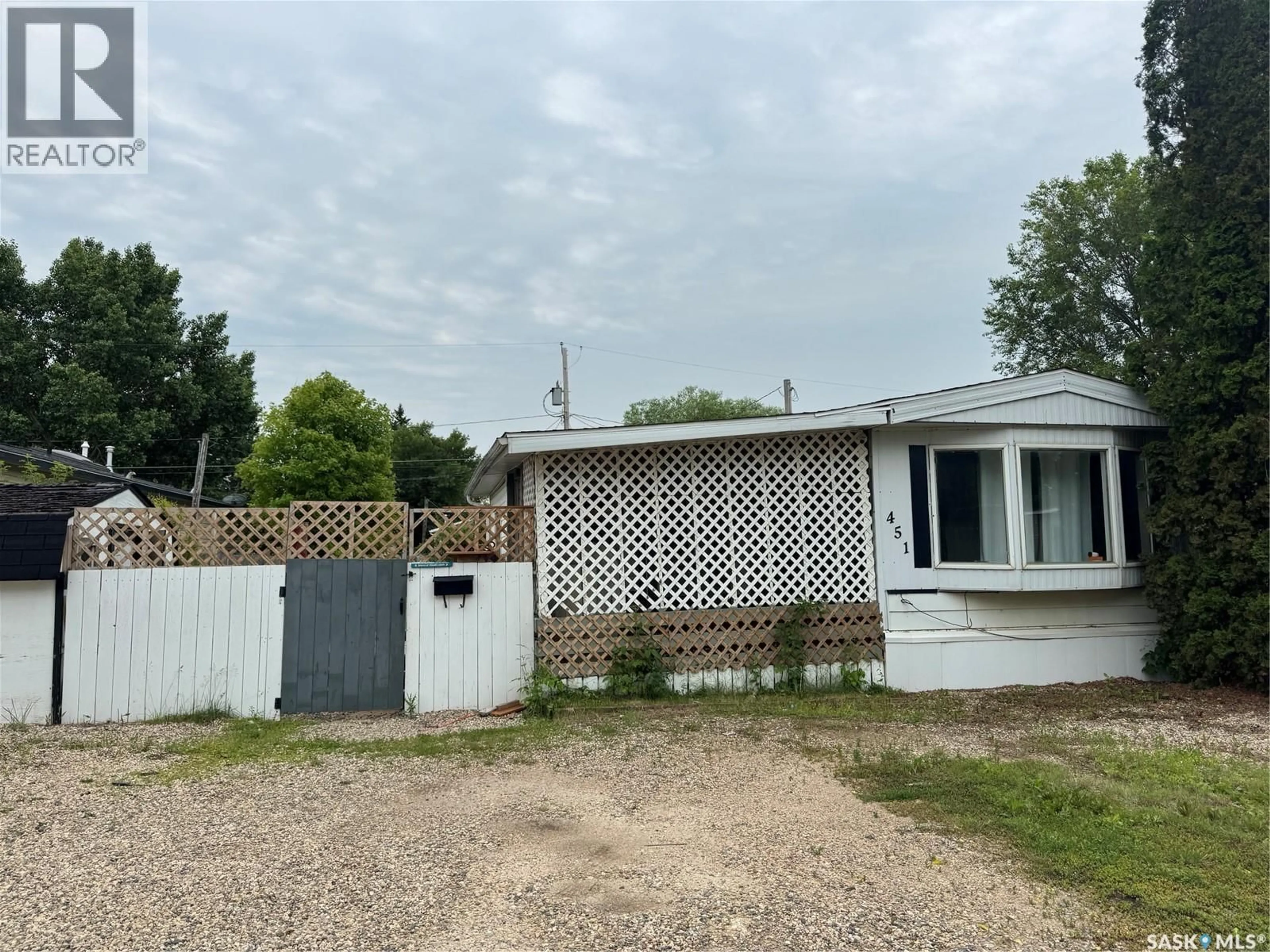 A pic from outside/outdoor area/front of a property/back of a property/a pic from drone, unknown for 451 34TH STREET, Battleford Saskatchewan S0M0E0