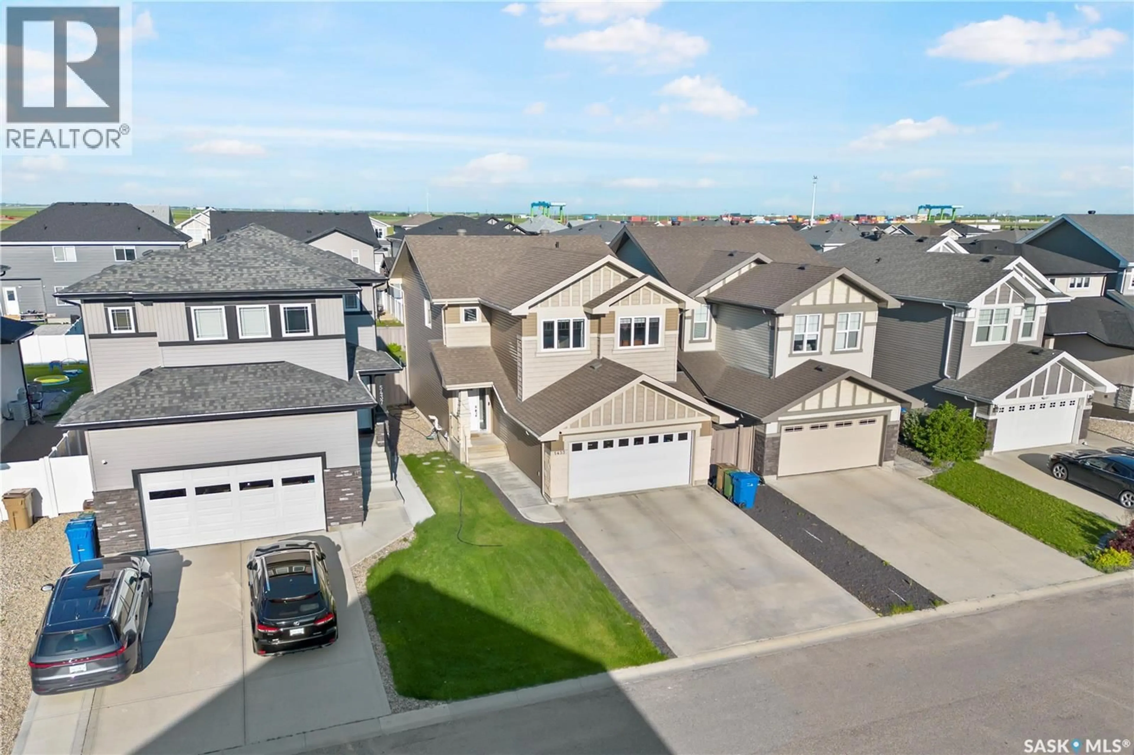 A pic from outside/outdoor area/front of a property/back of a property/a pic from drone, street for E - 5433 GREEN ALDER WAY, Regina Saskatchewan S4V3M7