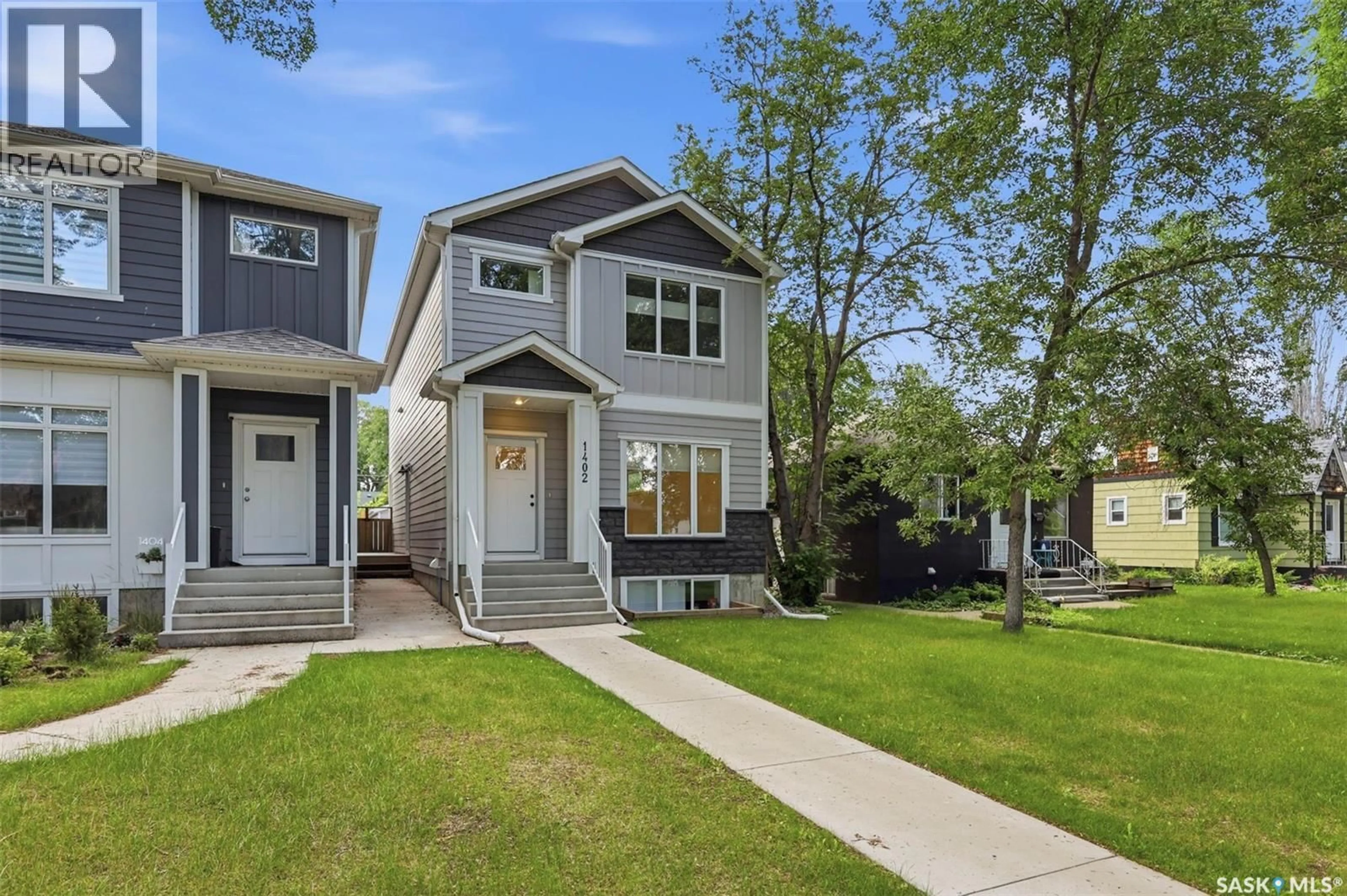 Home with vinyl exterior material, street for S - 1402 WIGGINS AVENUE, Saskatoon Saskatchewan S7H2J6