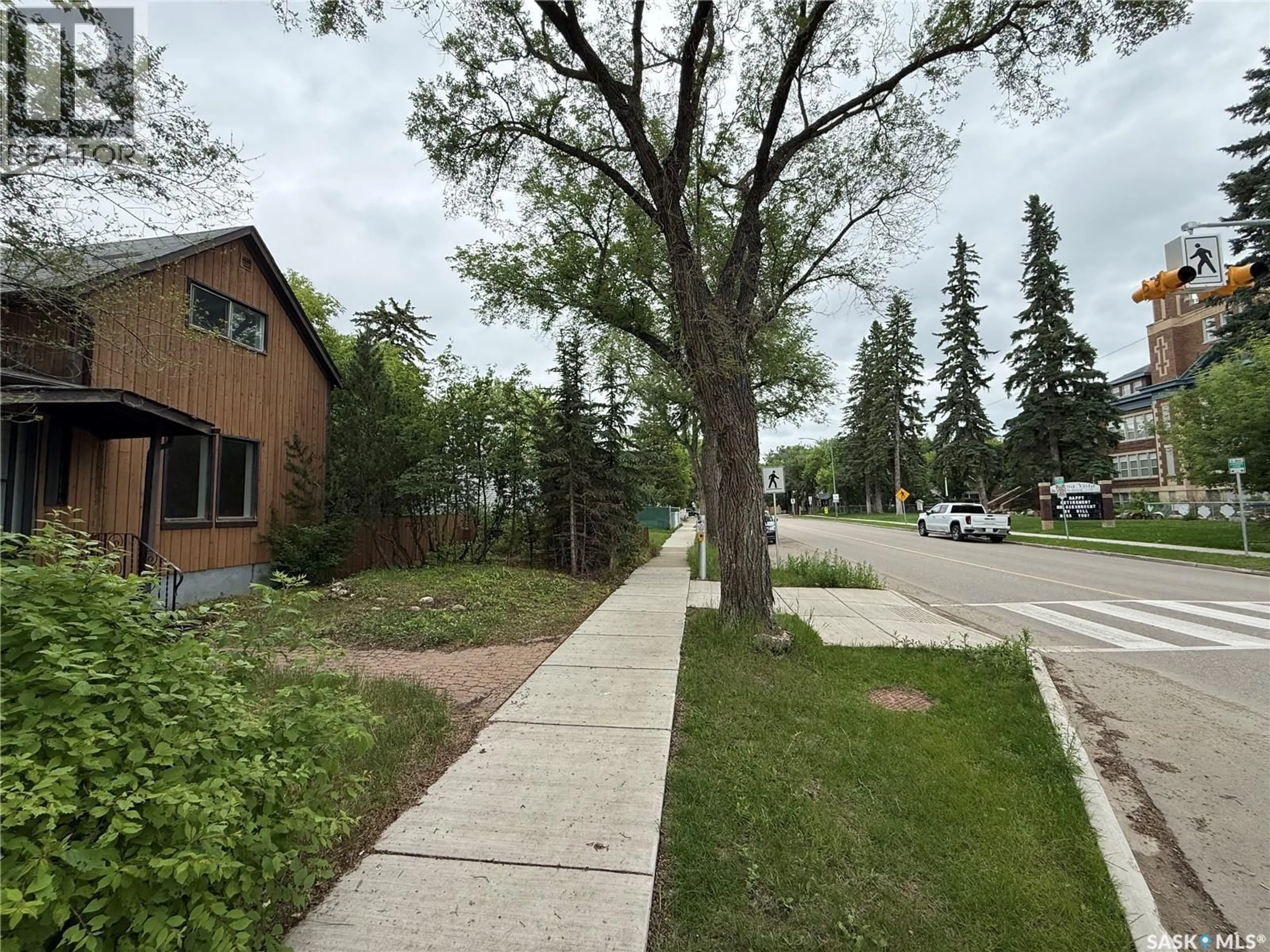 A pic from outside/outdoor area/front of a property/back of a property/a pic from drone, street for 1320 LORNE AVENUE, Saskatoon Saskatchewan S7H1X7