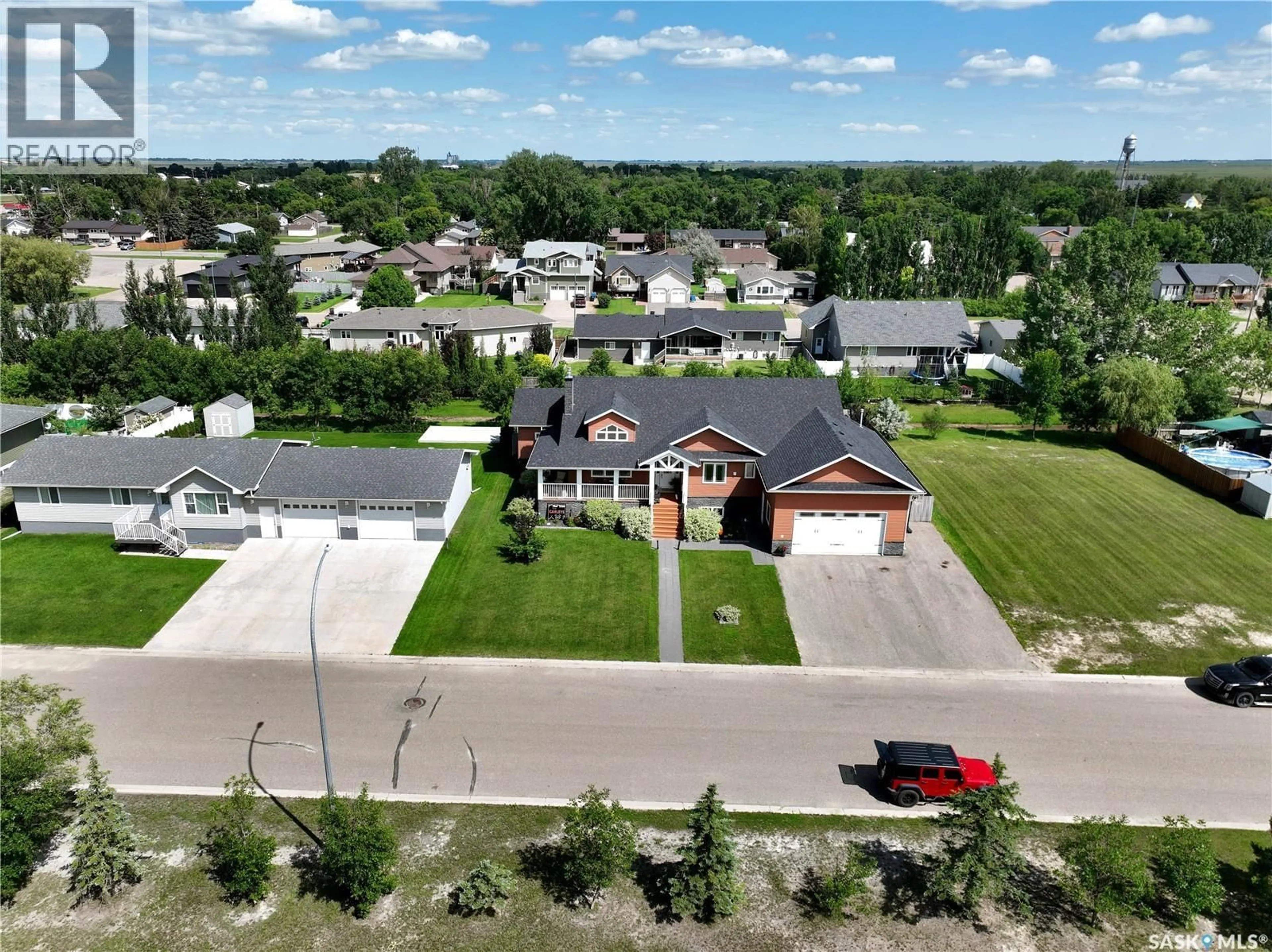 A pic from outside/outdoor area/front of a property/back of a property/a pic from drone, street for 207 6TH STREET, Carnduff Saskatchewan S0C0S0