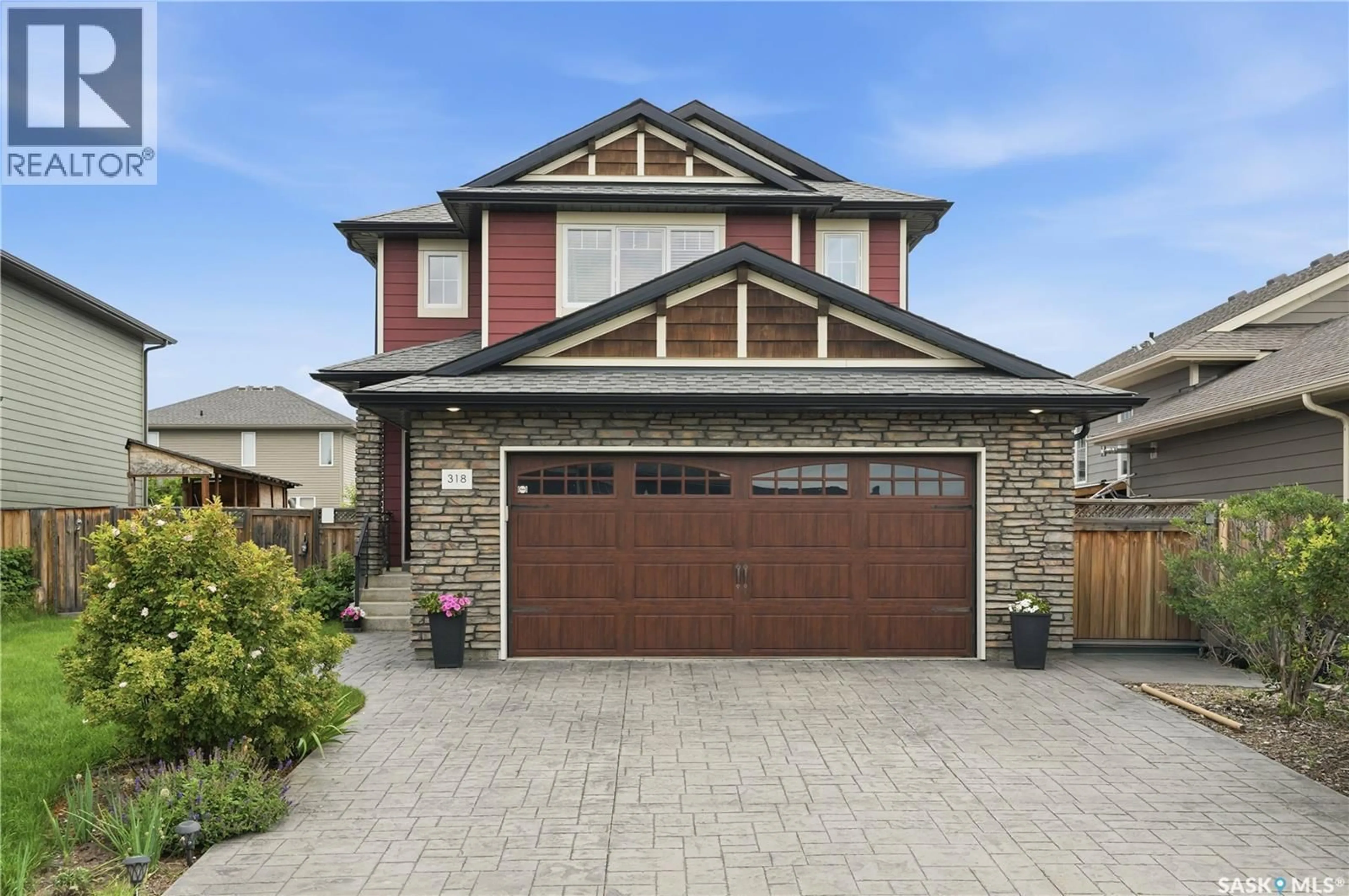 Home with brick exterior material, street for 318 CHUBB COVE, Saskatoon Saskatchewan S7T0E6