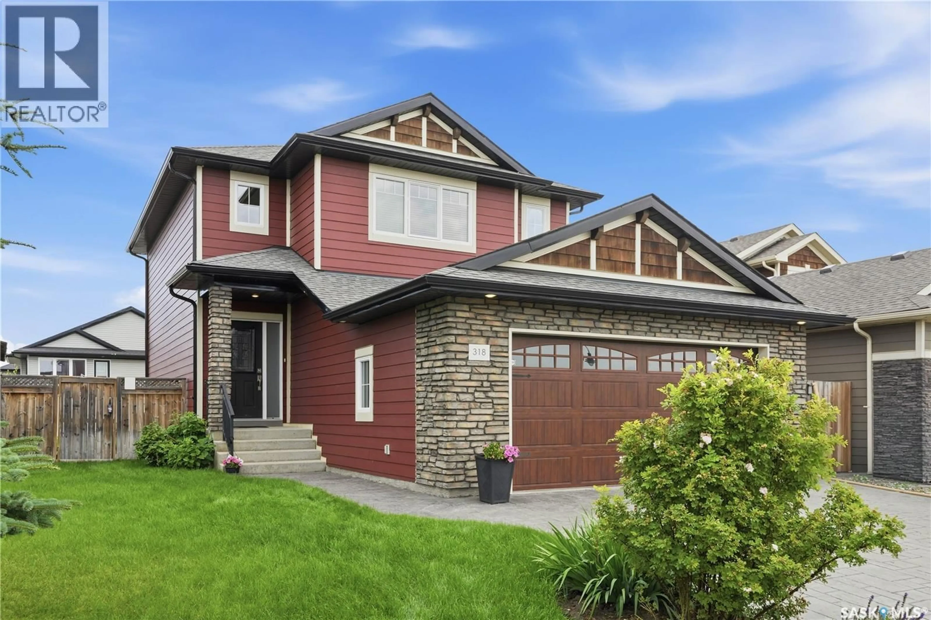 Home with brick exterior material, street for 318 CHUBB COVE, Saskatoon Saskatchewan S7T0E6