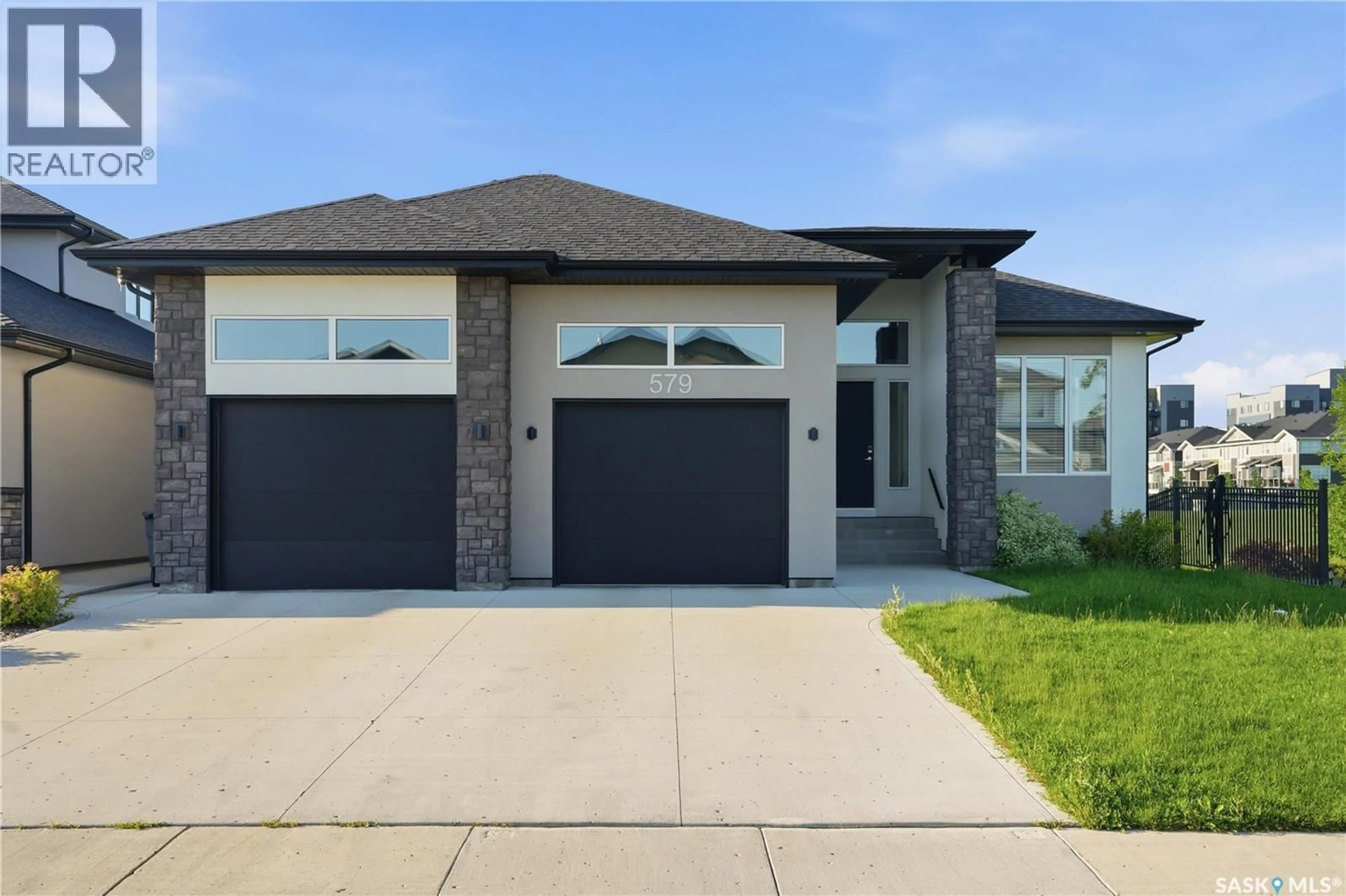 Home with brick exterior material, street for 579 BOYKOWICH CRESCENT, Saskatoon Saskatchewan S7W0S5