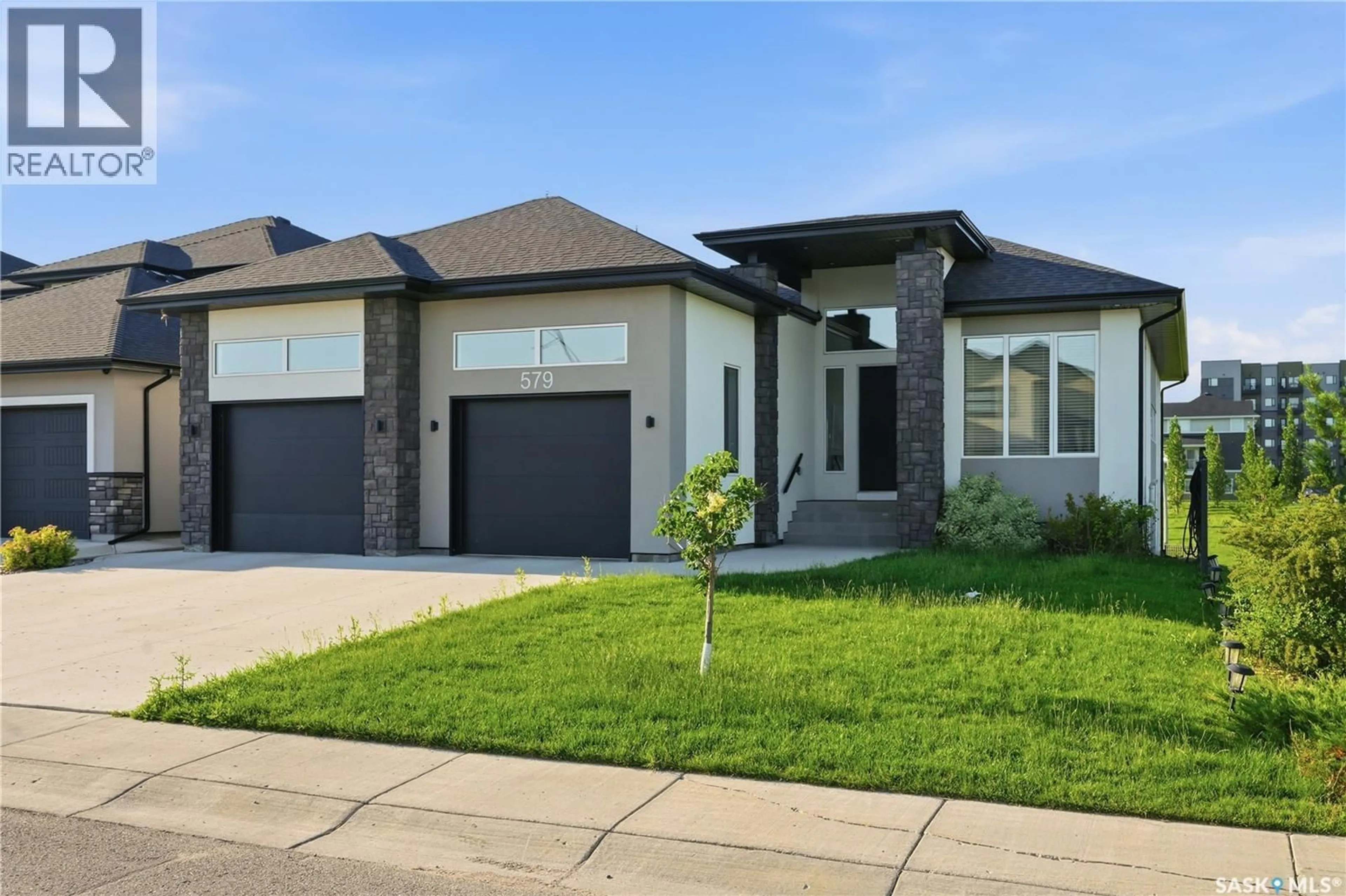Home with brick exterior material, street for 579 BOYKOWICH CRESCENT, Saskatoon Saskatchewan S7W0S5
