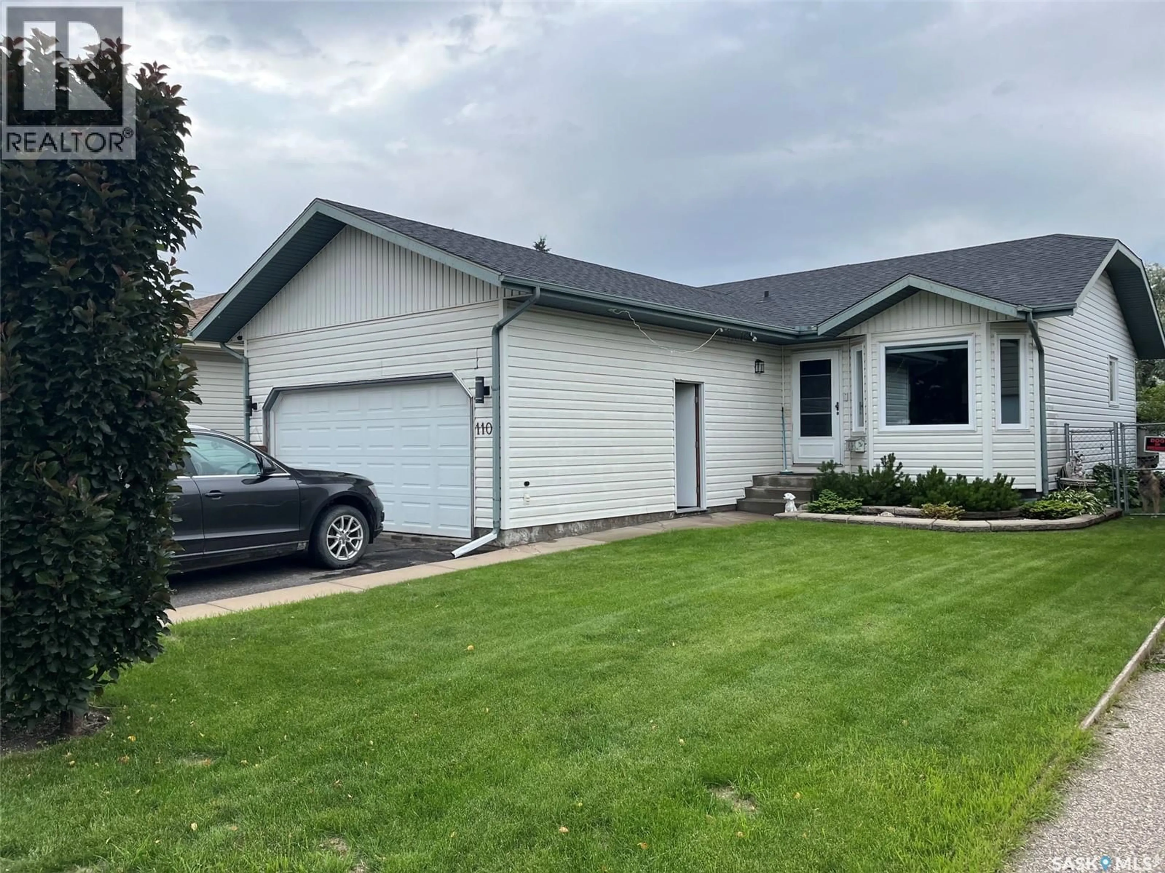Home with vinyl exterior material, street for 110 26TH STREET, Prince Albert Saskatchewan S6V1Z7