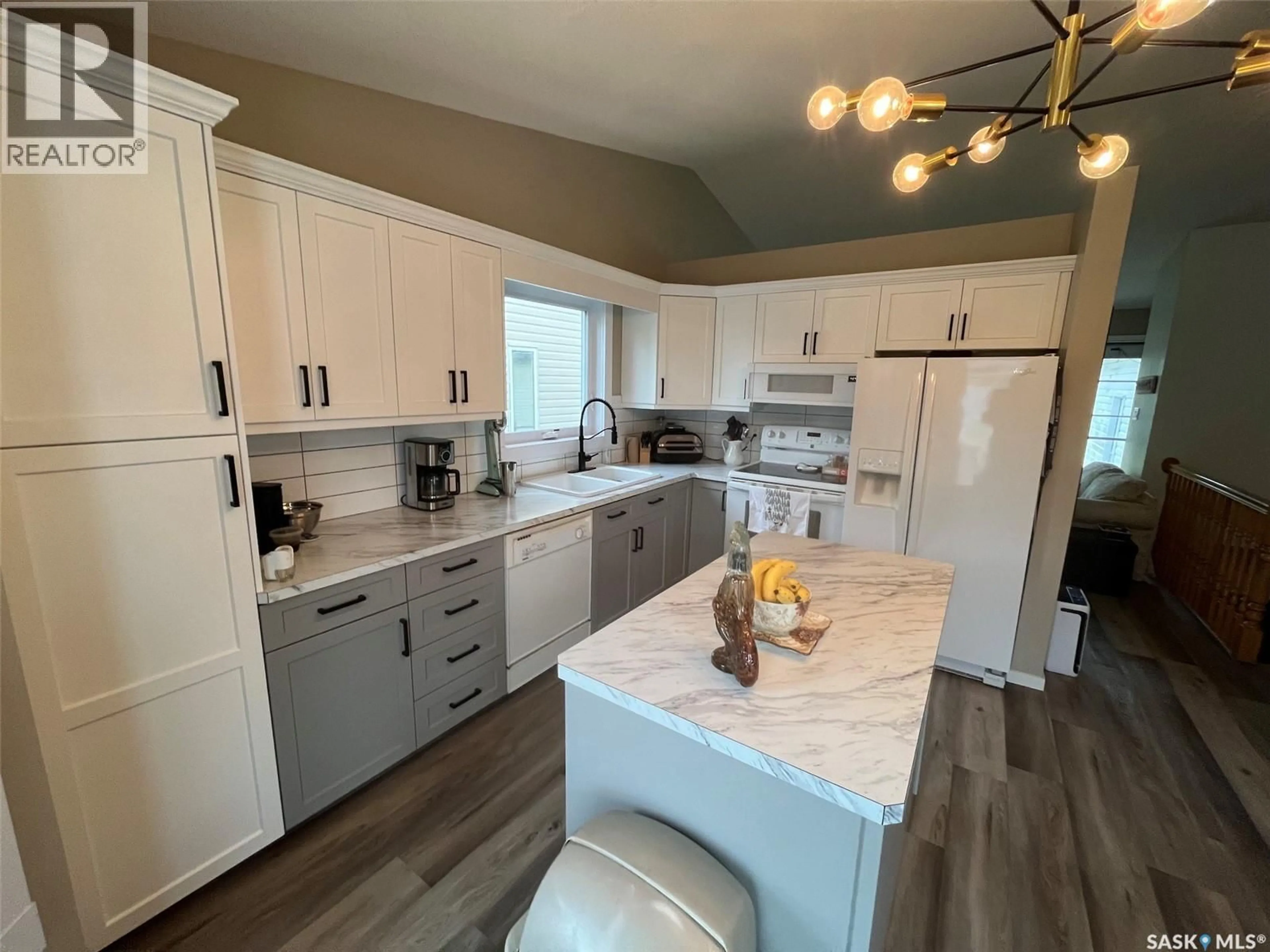 Open concept kitchen, unknown for 110 26TH STREET, Prince Albert Saskatchewan S6V1Z7