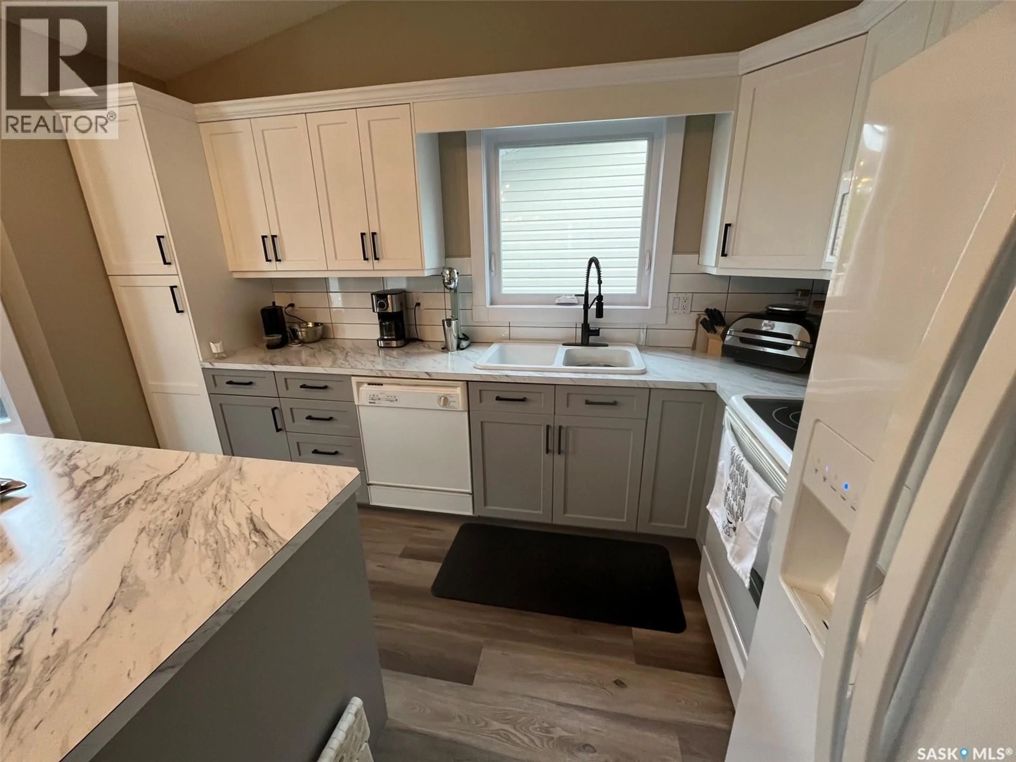 Open concept kitchen, ceramic/tile floor for 110 26TH STREET, Prince Albert Saskatchewan S6V1Z7