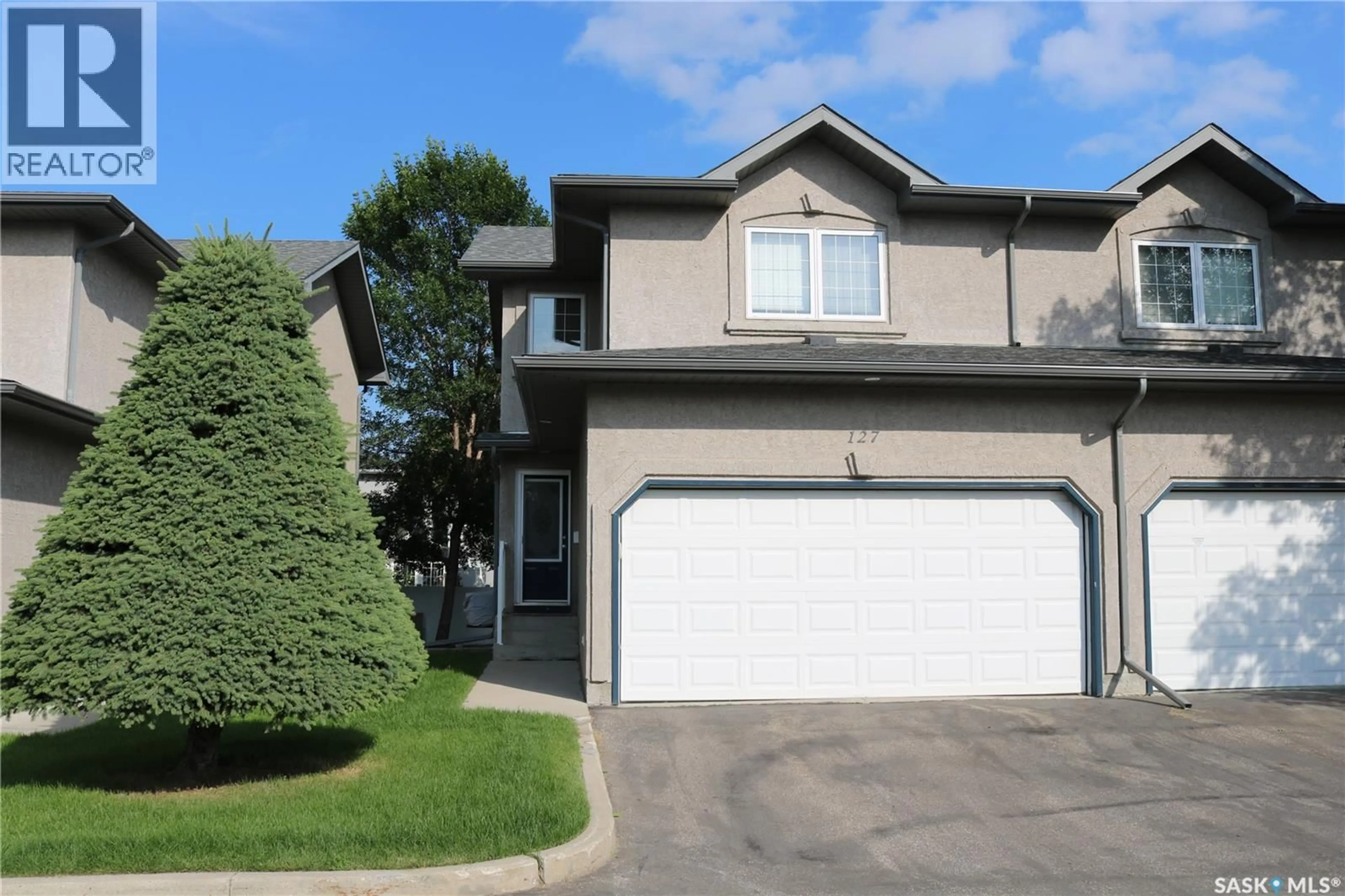 Home with vinyl exterior material, street for 405 - 127 BAYFIELD CRESCENT, Saskatoon Saskatchewan S7V1J4
