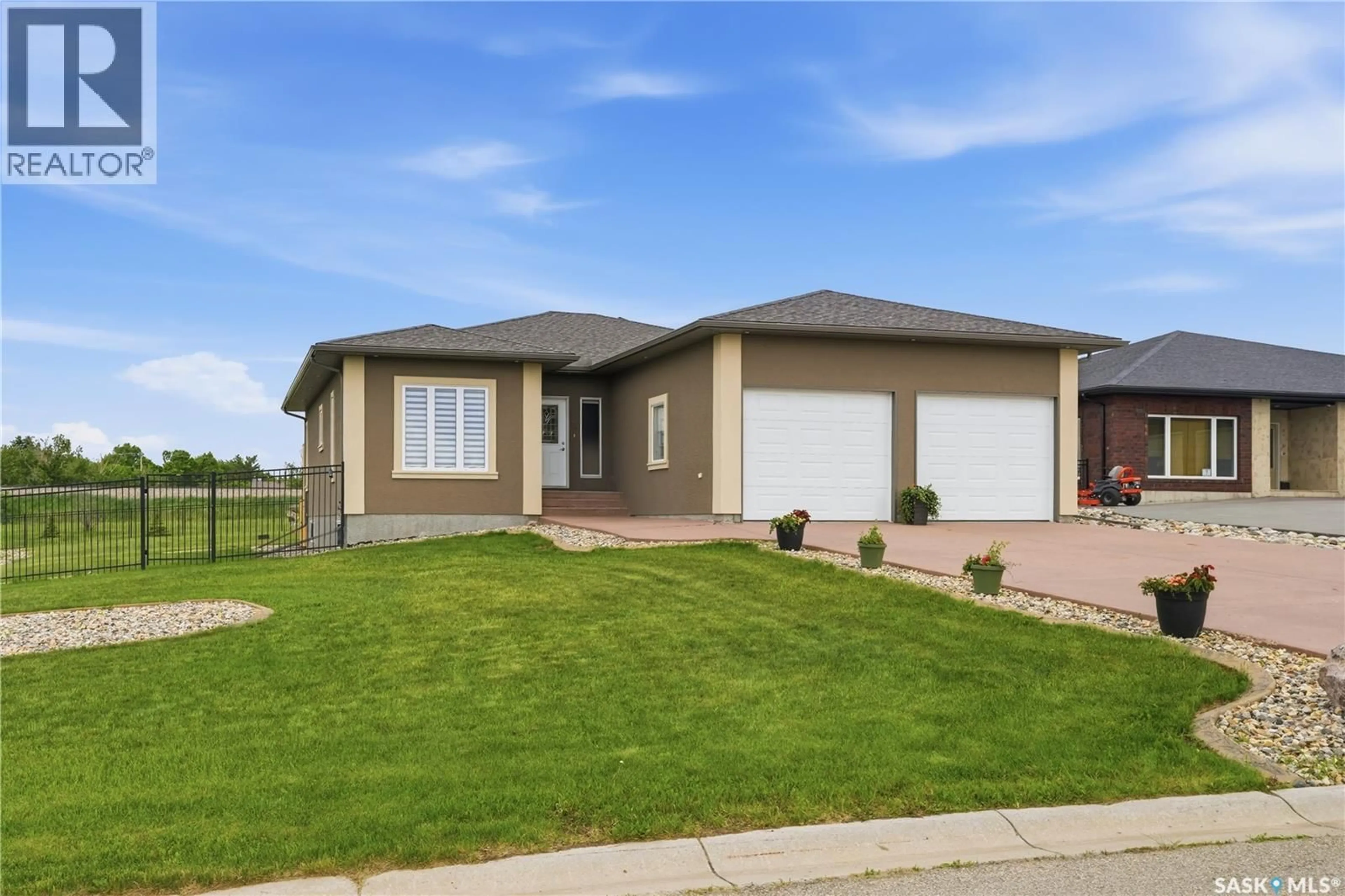 Home with vinyl exterior material, street for 3 IRON BRIDGE TERRACE, Moose Jaw Saskatchewan S6J0B5