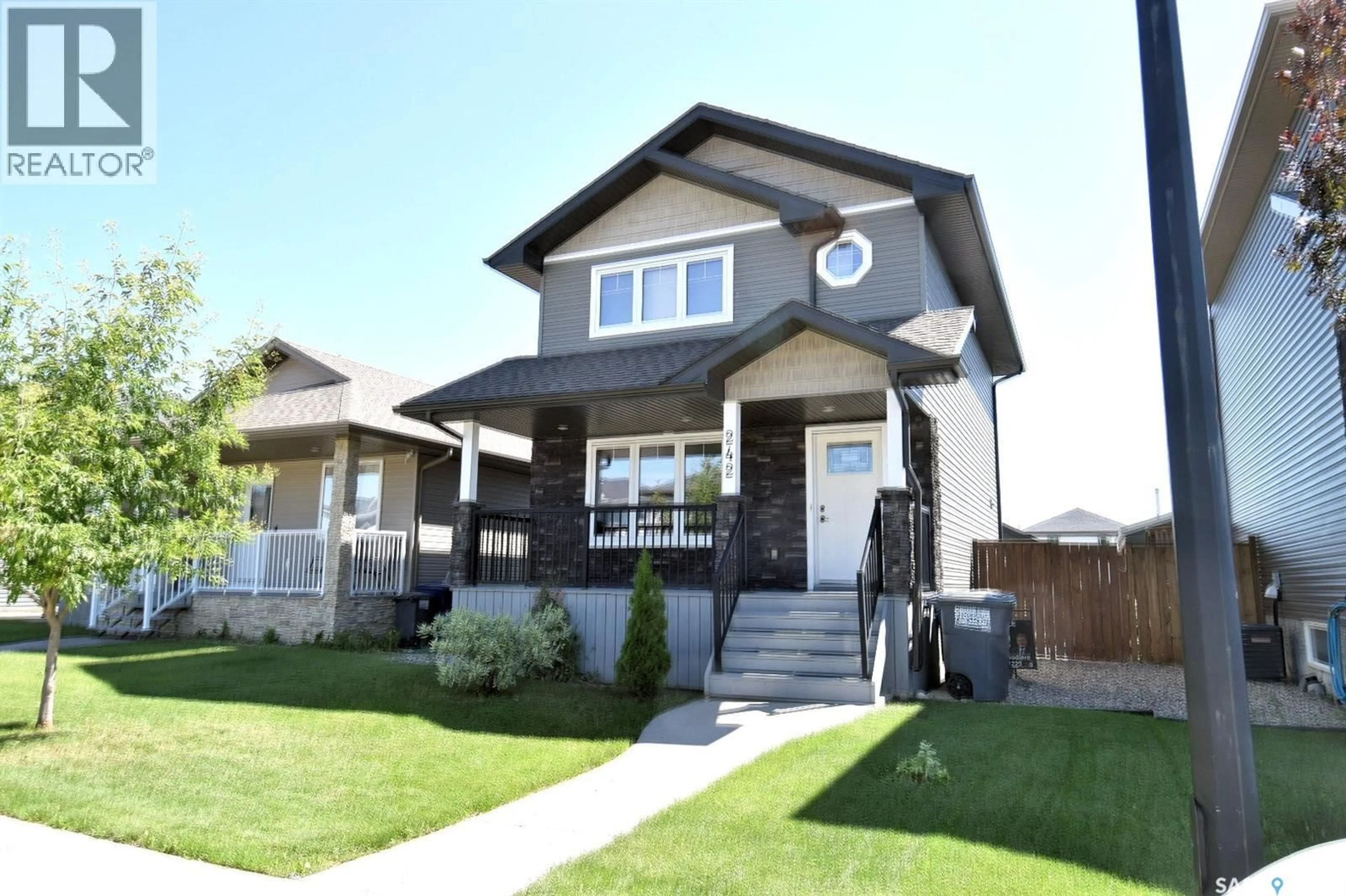 Home with vinyl exterior material, street for 242 GEARY CRESCENT, Saskatoon Saskatchewan S7R0E6