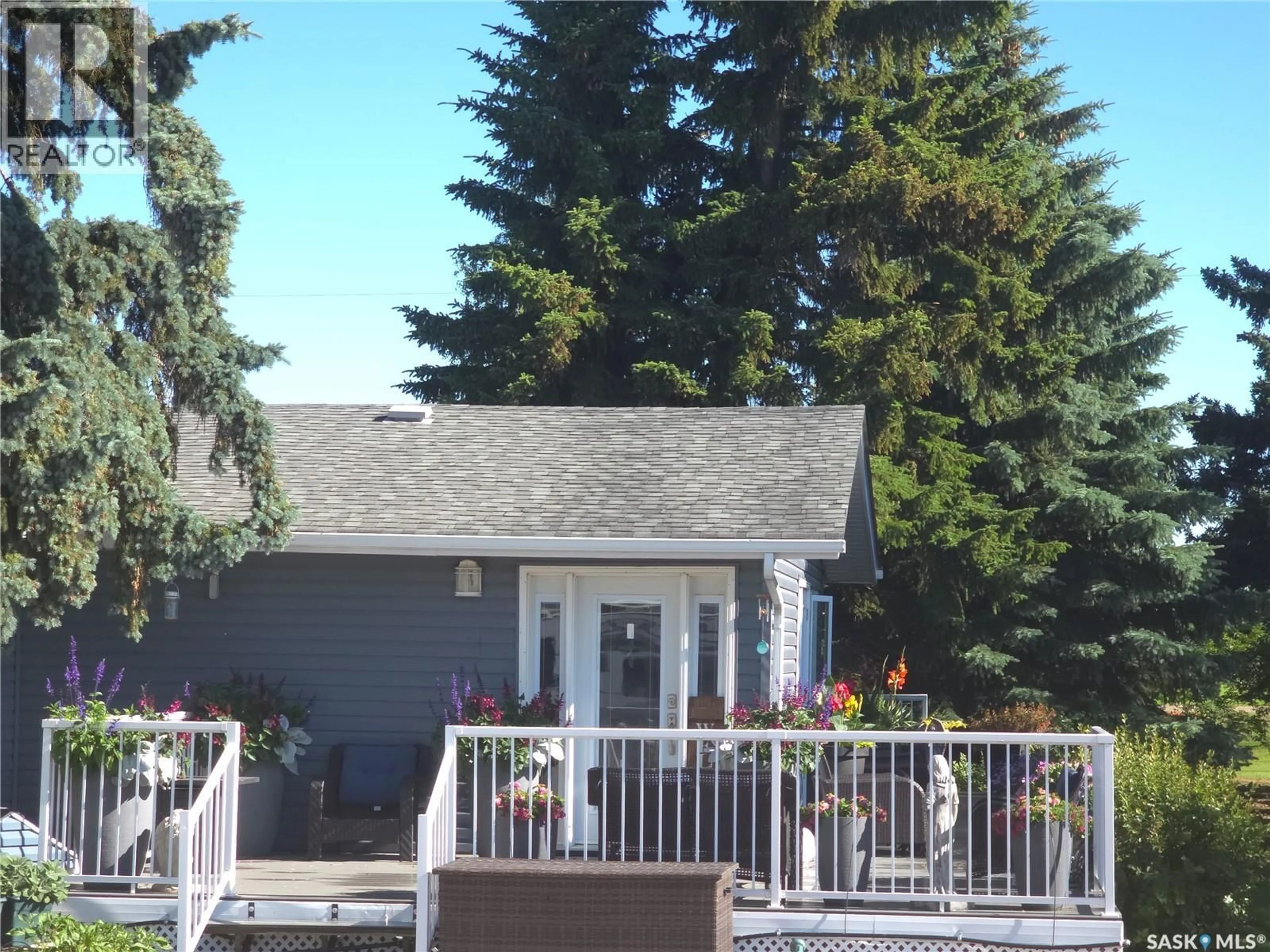 Home with vinyl exterior material, mountain view for FLOWERVILLE AVENUE, Lac Pelletier Rm No. 107 Saskatchewan S0N0E0