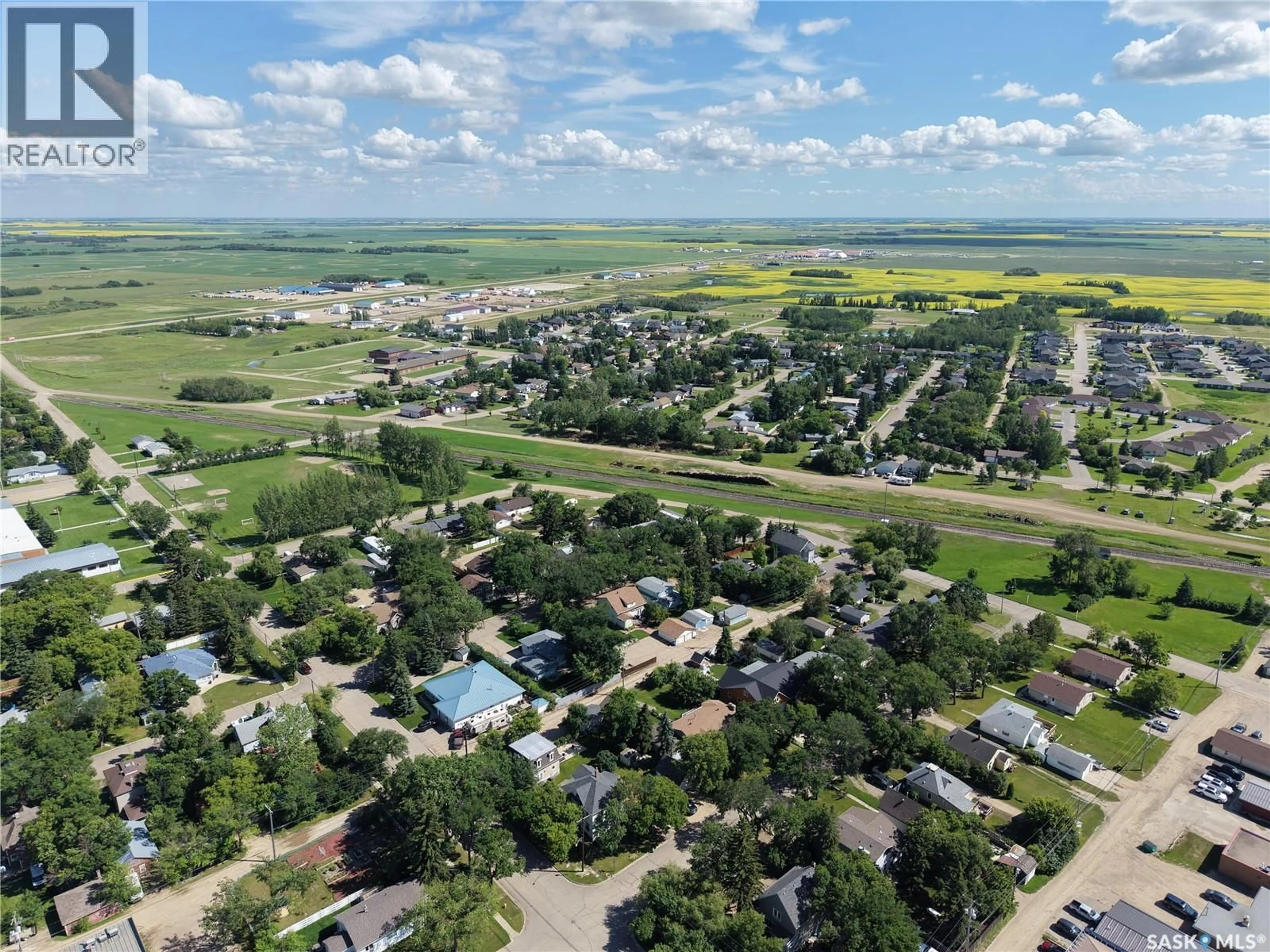 A pic from outside/outdoor area/front of a property/back of a property/a pic from drone, street for 320 6TH STREET, Carlyle Saskatchewan S0C0R0