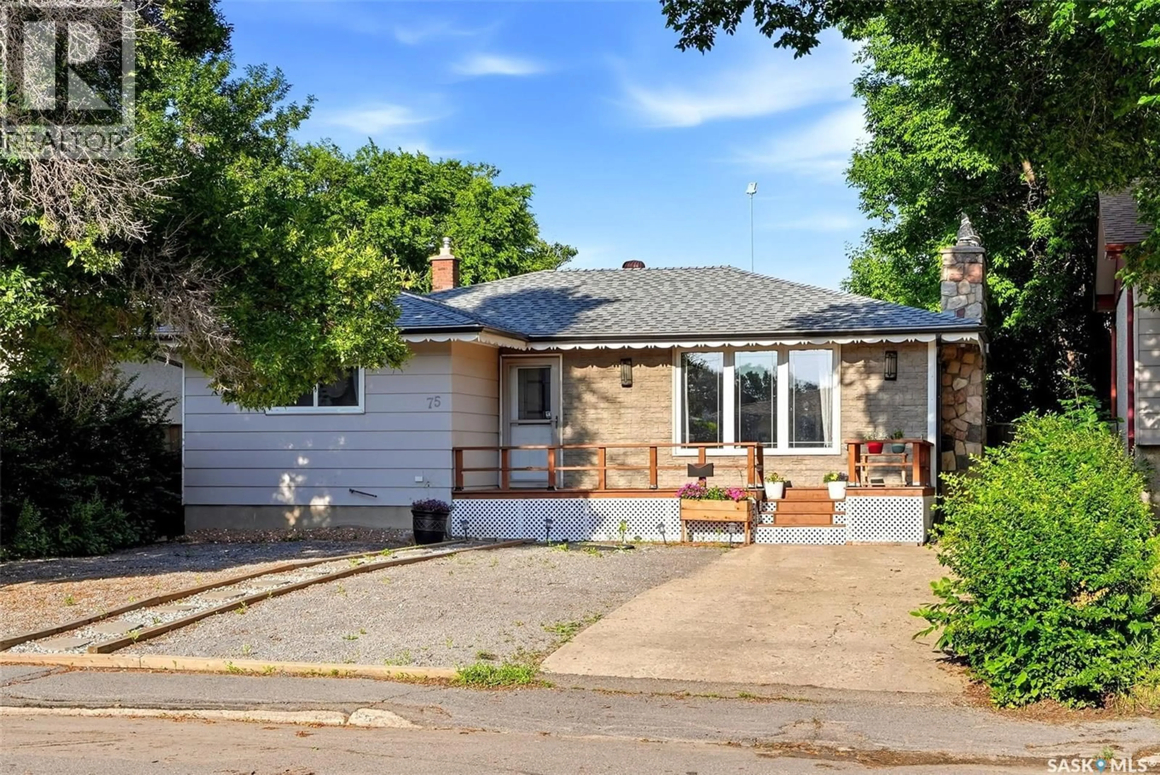 Home with brick exterior material, street for 75 ROTHWELL CRESCENT, Regina Saskatchewan S4N1R5