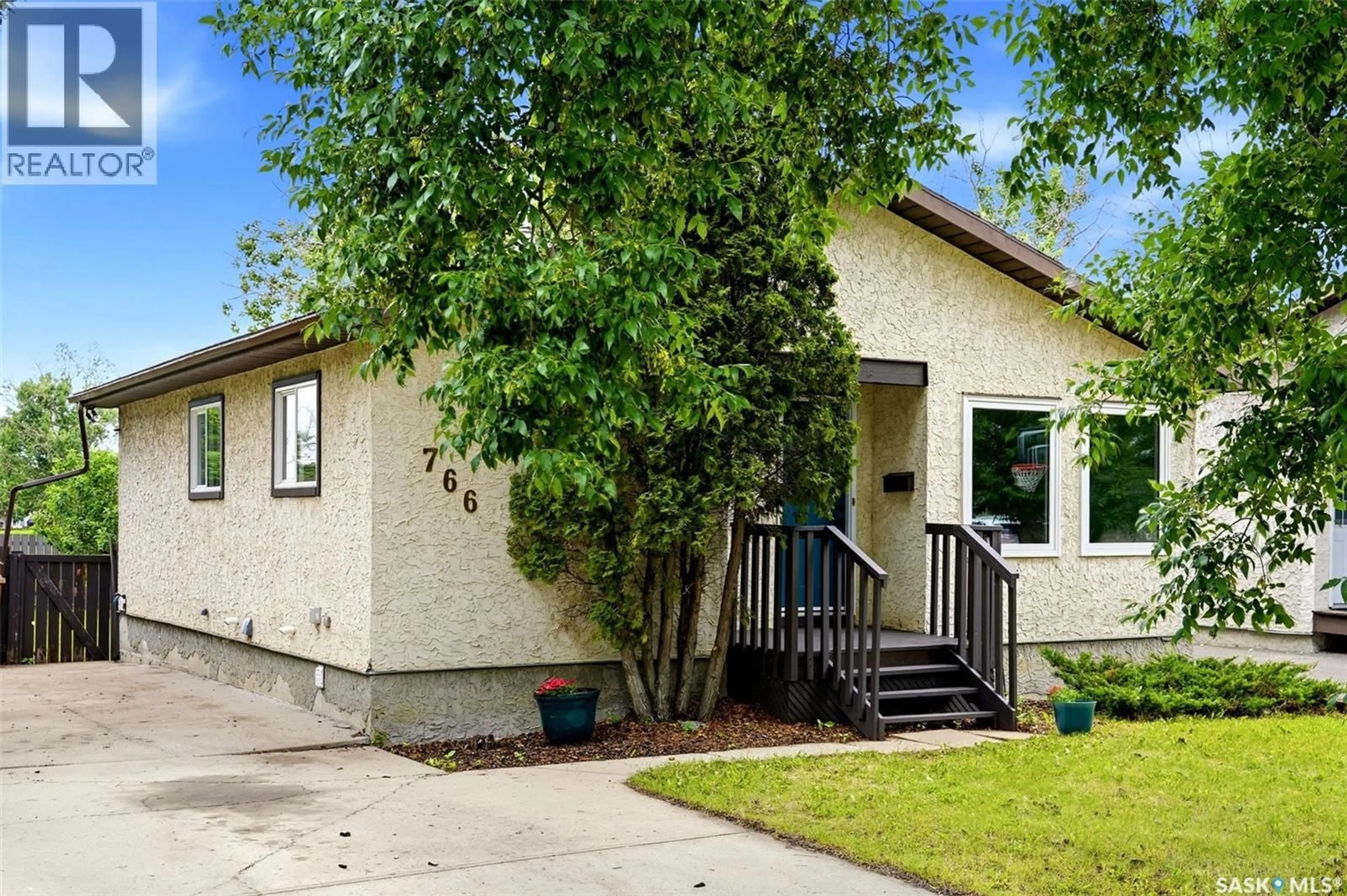 Home with vinyl exterior material, street for 766 HAYWORTH CRESCENT, Regina Saskatchewan S4X1Y1