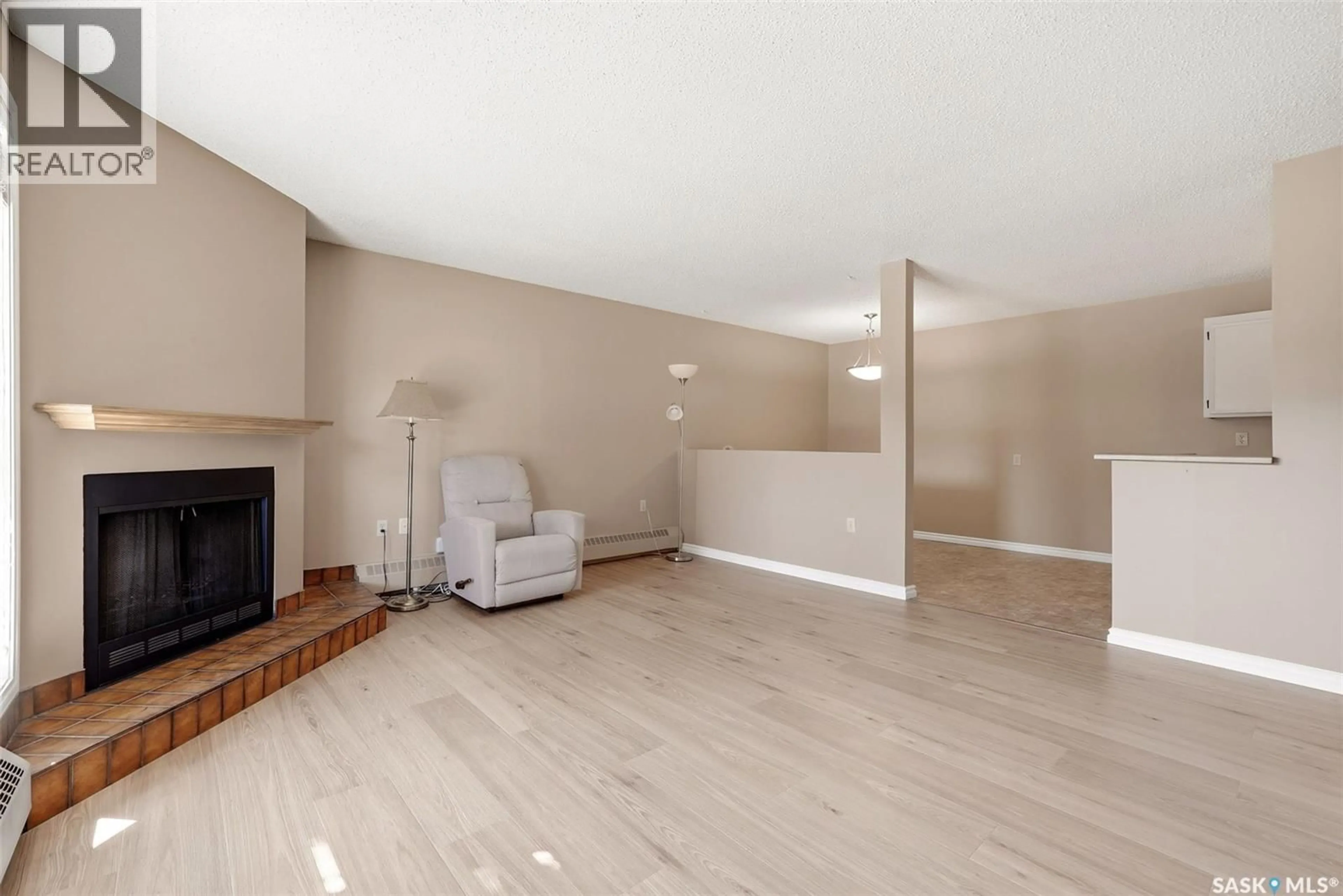 Living room with furniture, unknown for 102 - 2921 HARDING STREET, Regina Saskatchewan S4V1B9