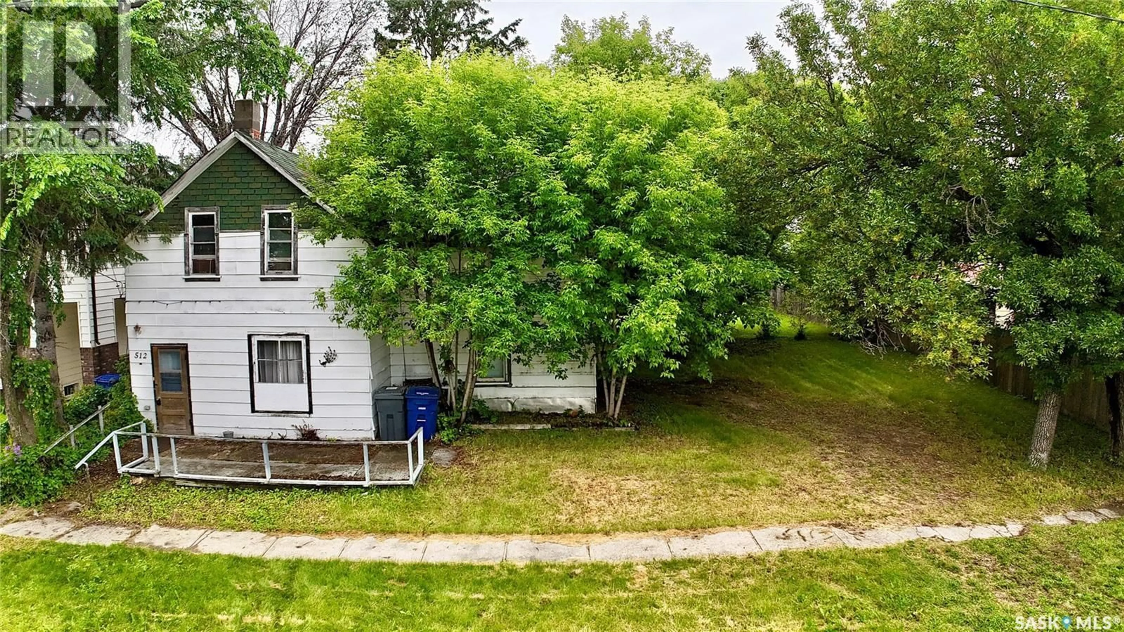 A pic from outside/outdoor area/front of a property/back of a property/a pic from drone, street for 512 MAPLE STREET, Esterhazy Saskatchewan S0A0X0