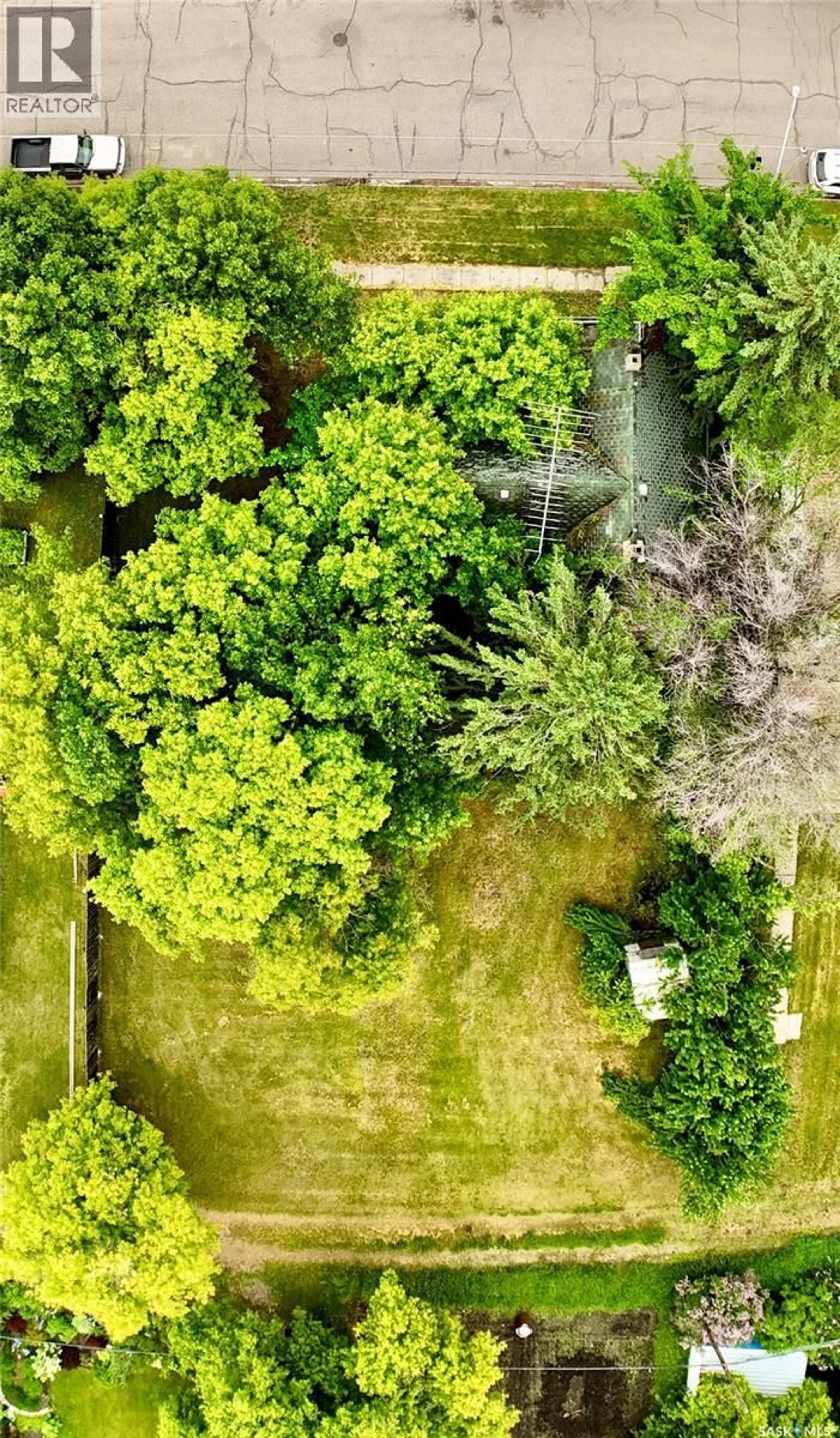 A pic from outside/outdoor area/front of a property/back of a property/a pic from drone, forest/trees view for 512 MAPLE STREET, Esterhazy Saskatchewan S0A0X0