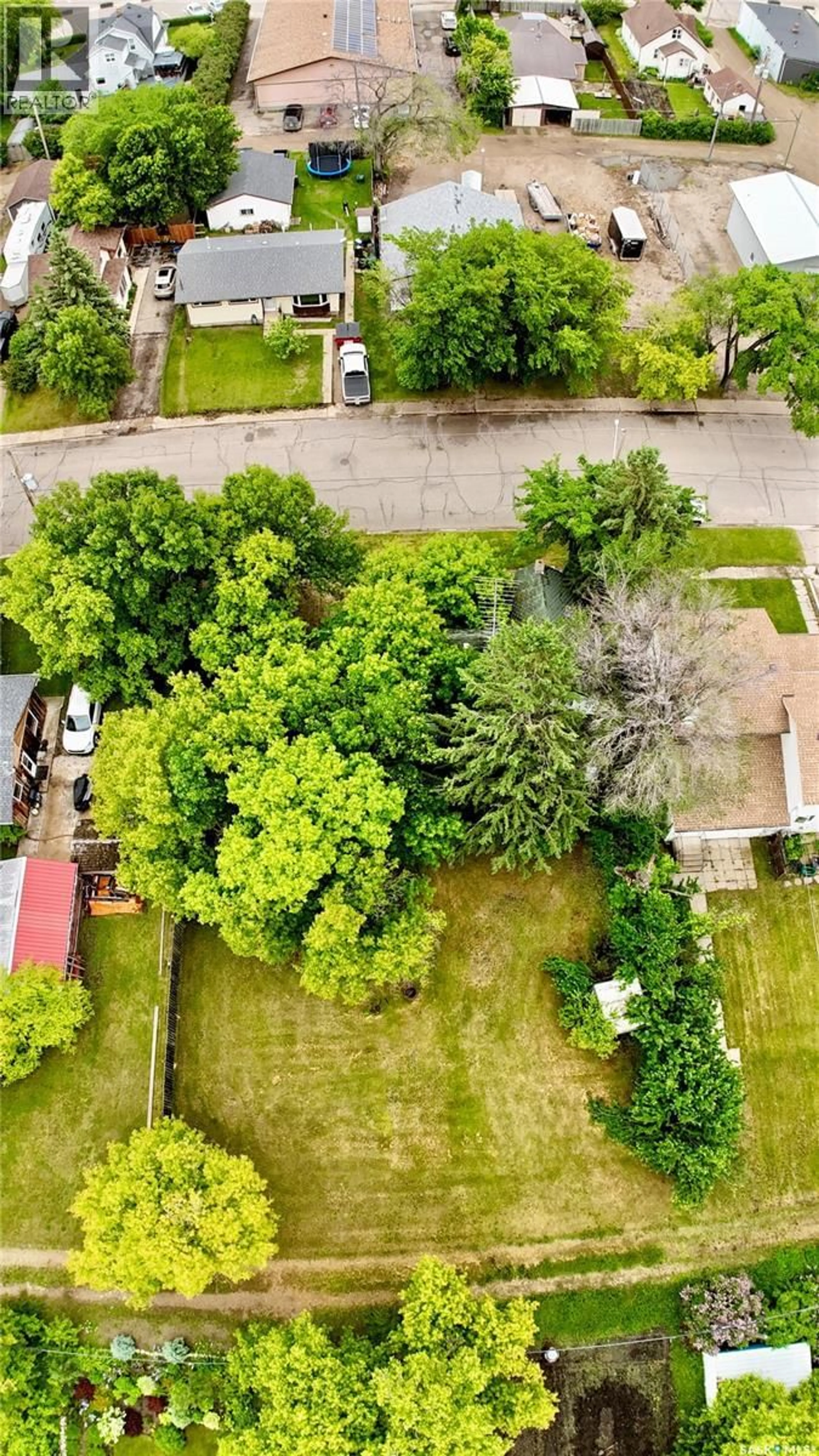 A pic from outside/outdoor area/front of a property/back of a property/a pic from drone, street for 512 MAPLE STREET, Esterhazy Saskatchewan S0A0X0